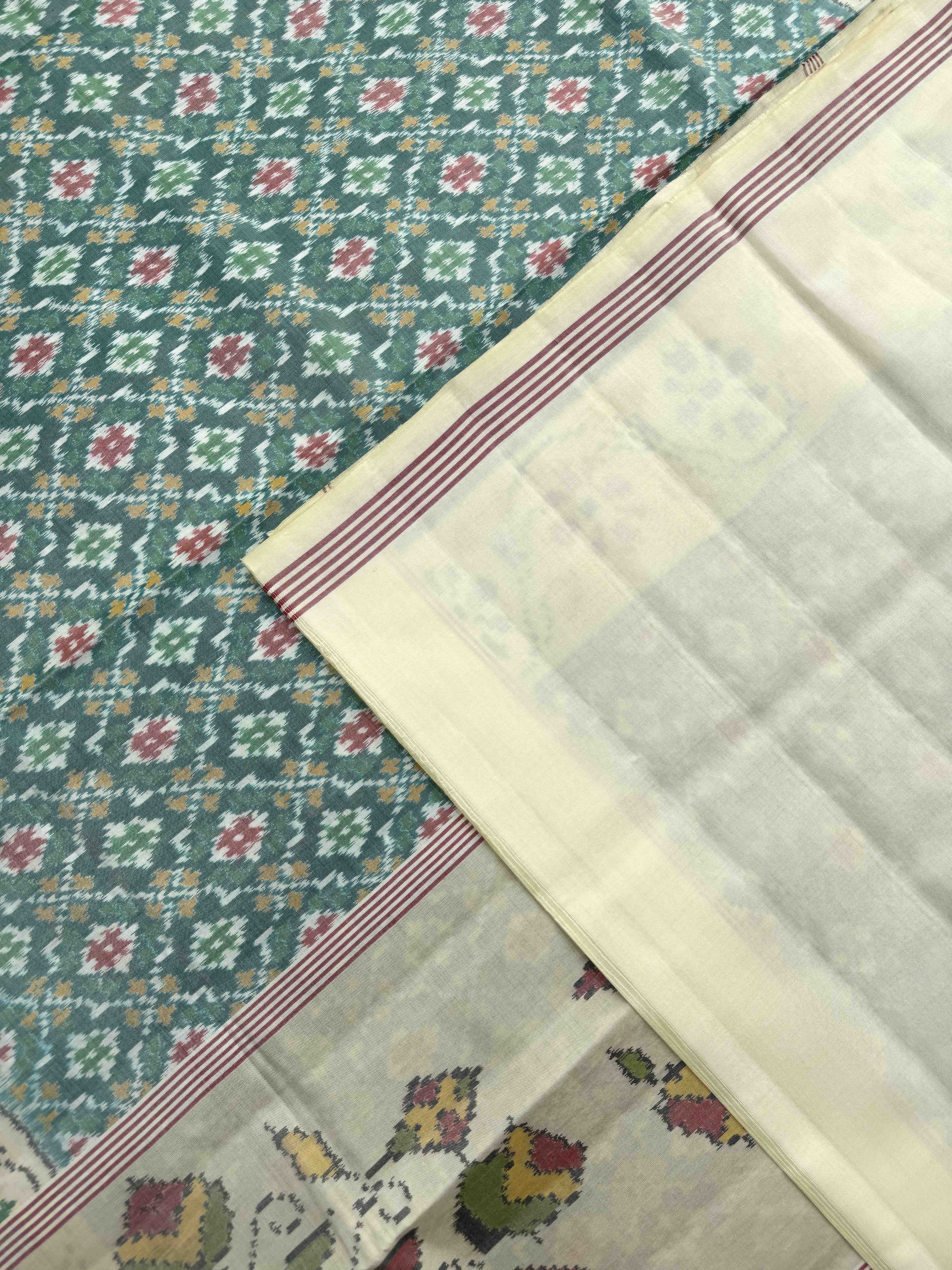 Off White & Light Green Buttonful Single Ikat Patan Patola Saree