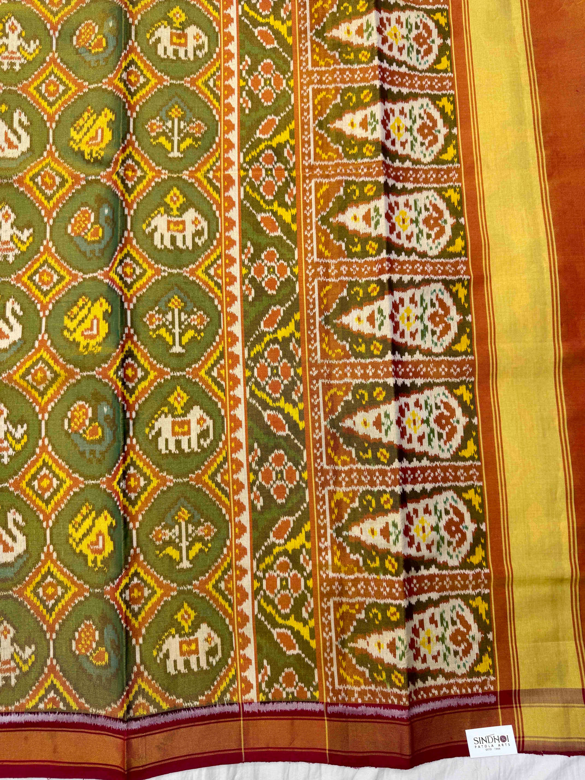 Maroon & Green Small Circle Narikunj Tissue Patola Saree
