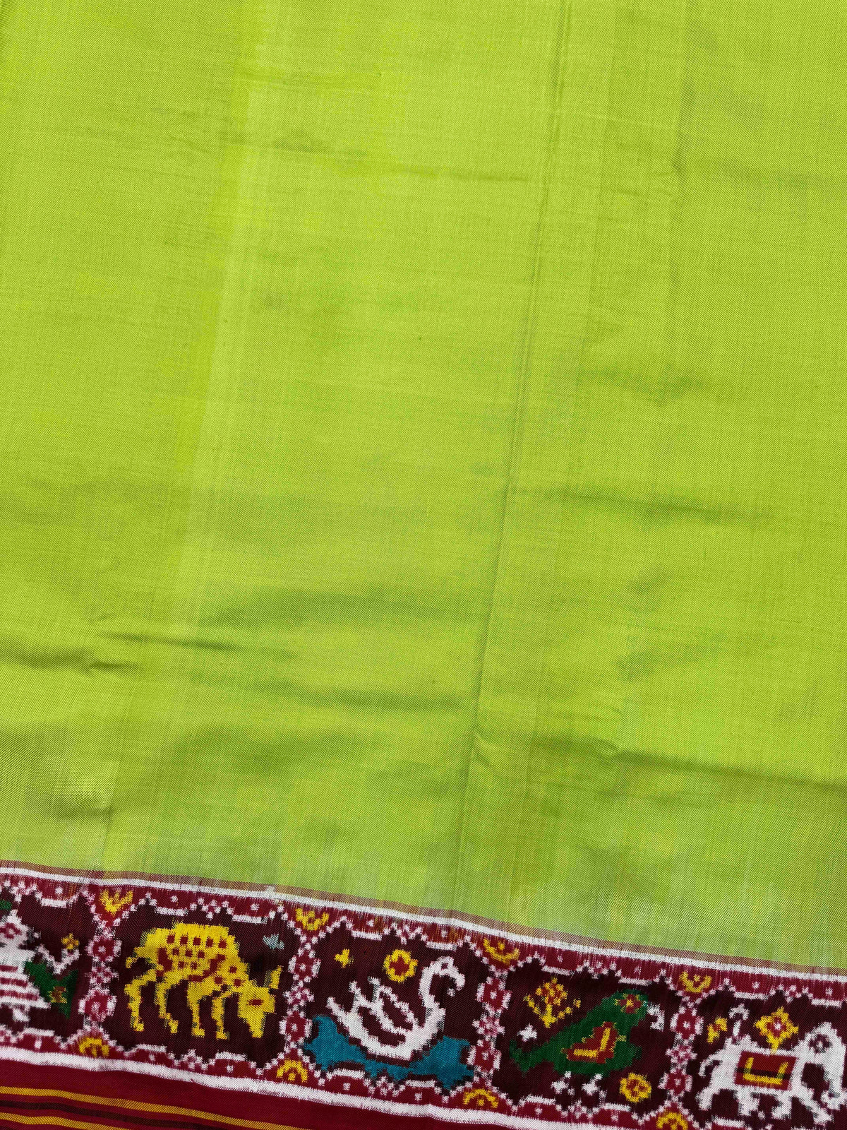 Maroon & Light Paroot Green Plain with Narikunj Border Pallu Double Ikat Patan Patola Saree