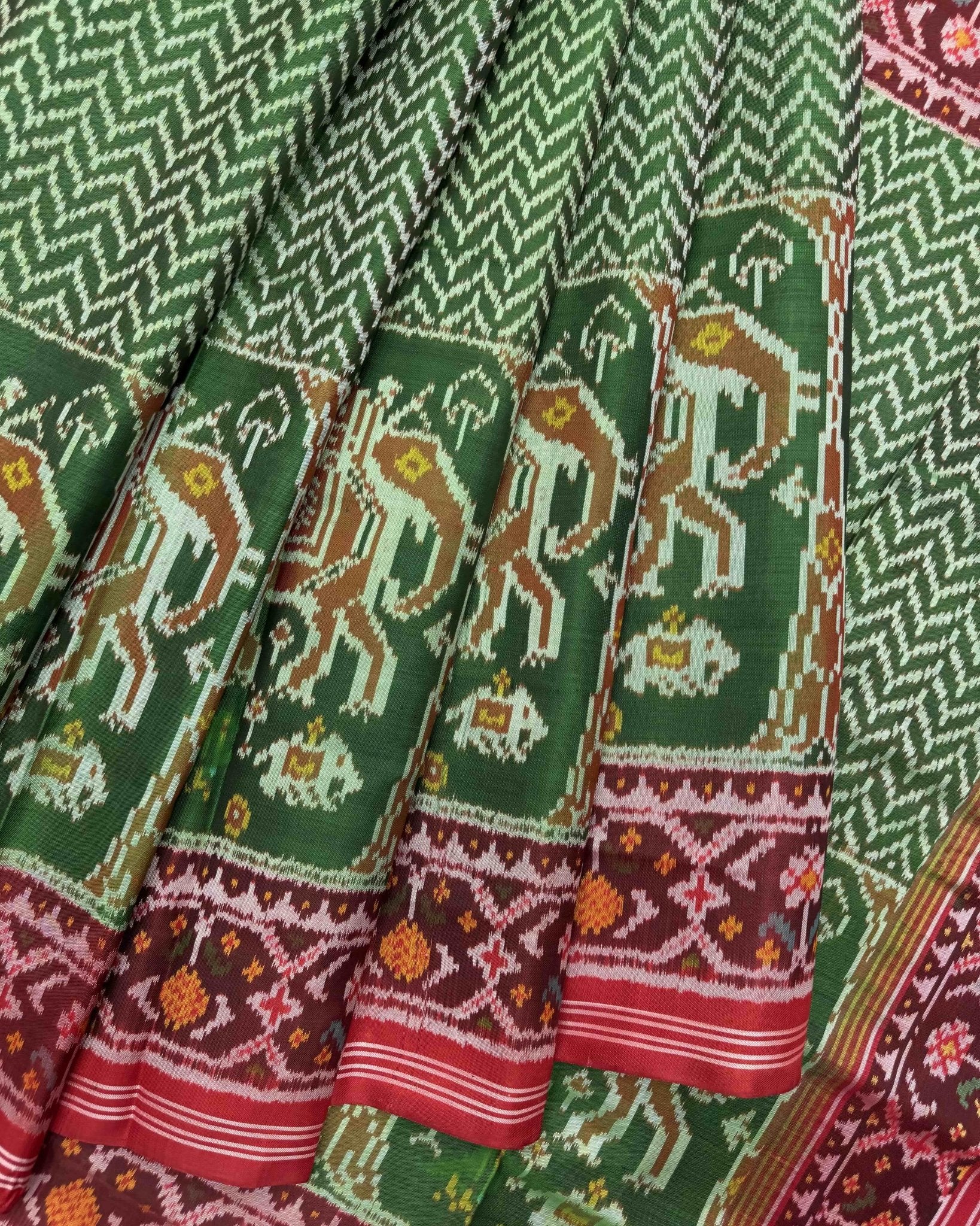 Red & Green Zig Zag Lining with Elephant Scut Border Semi Double Ikat Patola Saree - SindhoiPatolaArt