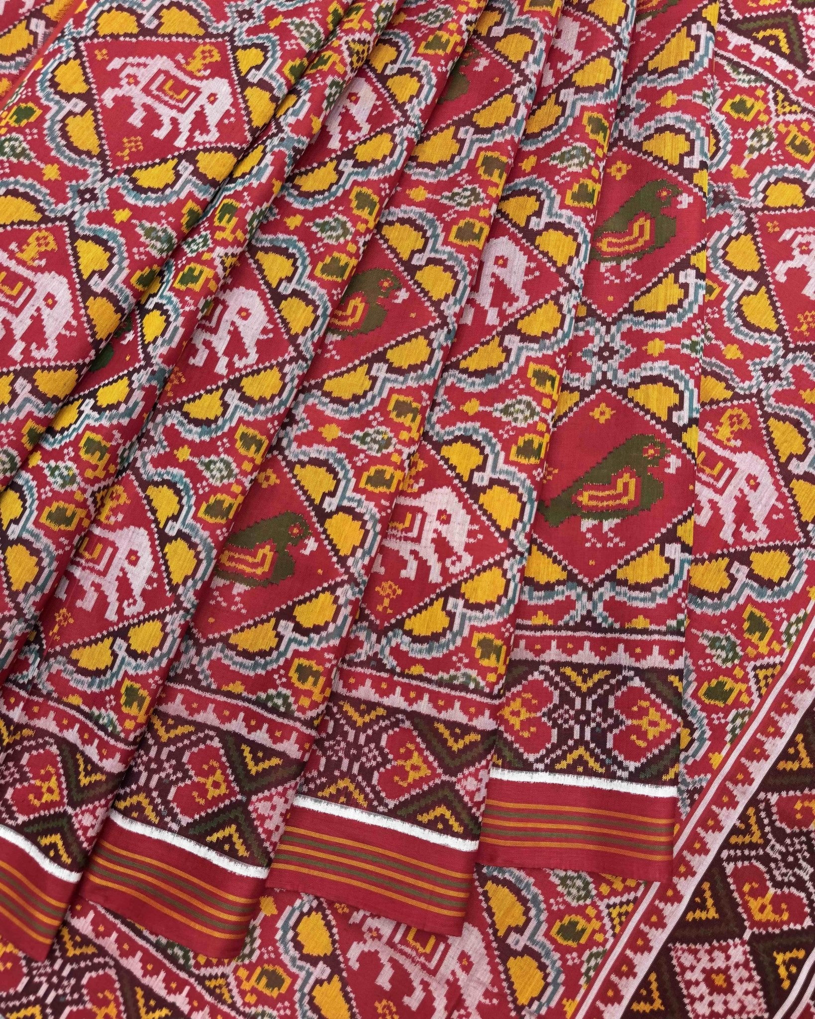 Red & Yellow Big Figure Narikunj Semi Double Ikat Patola Saree - SindhoiPatolaArt