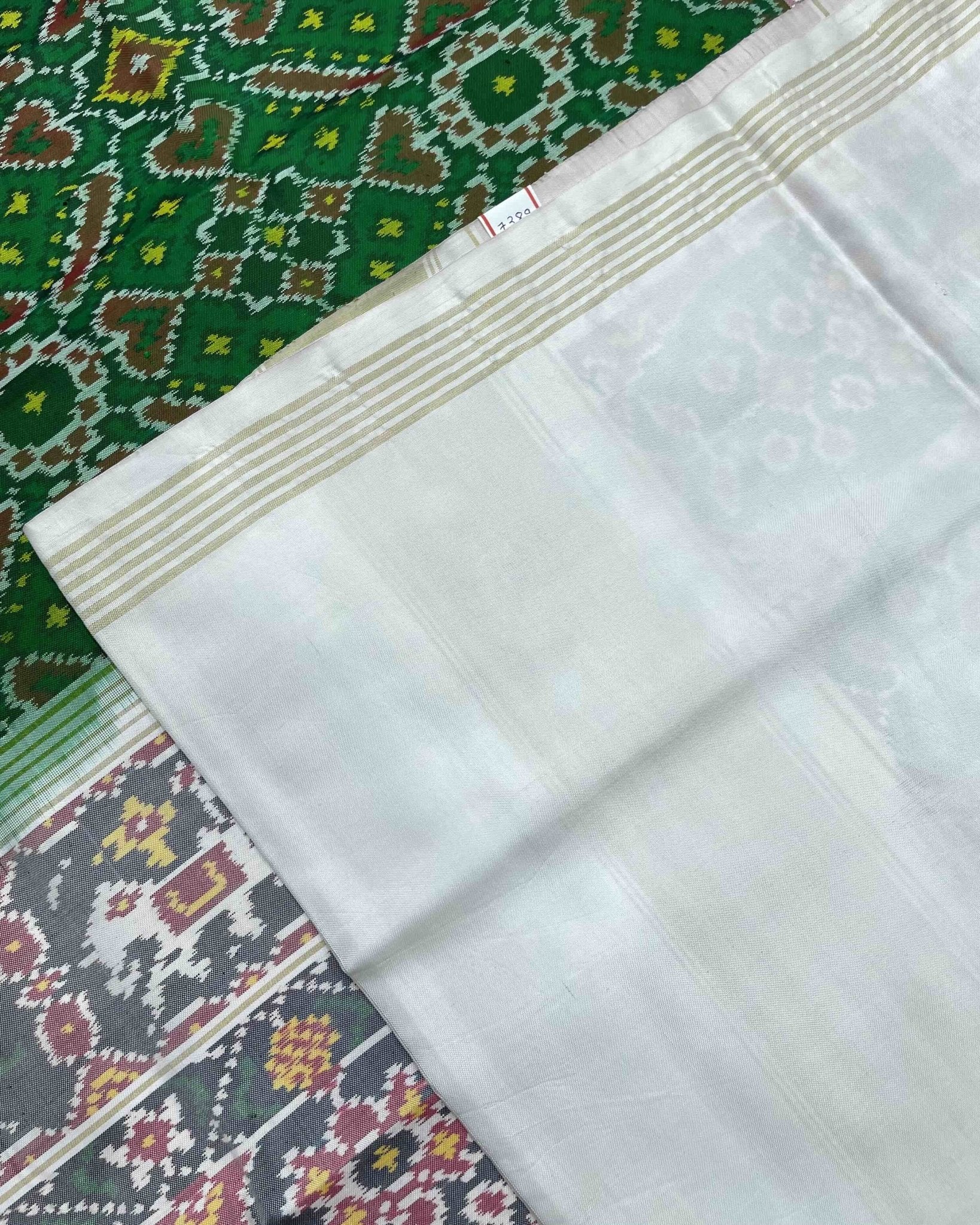 White & Green Manekchowk Patola Saree - SindhoiPatolaArt