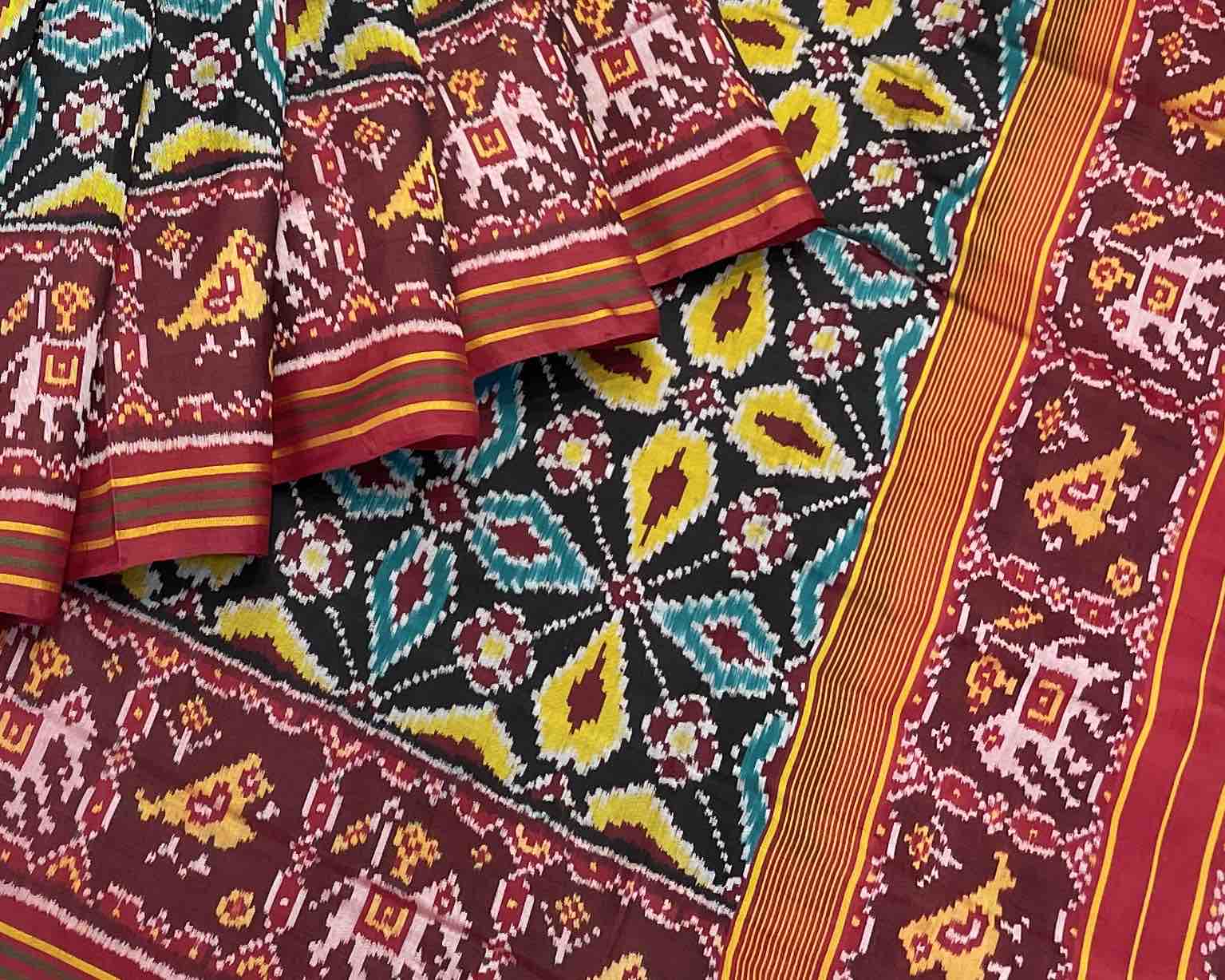 black new fancy design with traditional red narikunj pallu patola saree - SindhoiPatolaArt