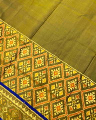 Blue & Mehendi Plain with Panchanda Scut Border Patola Saree