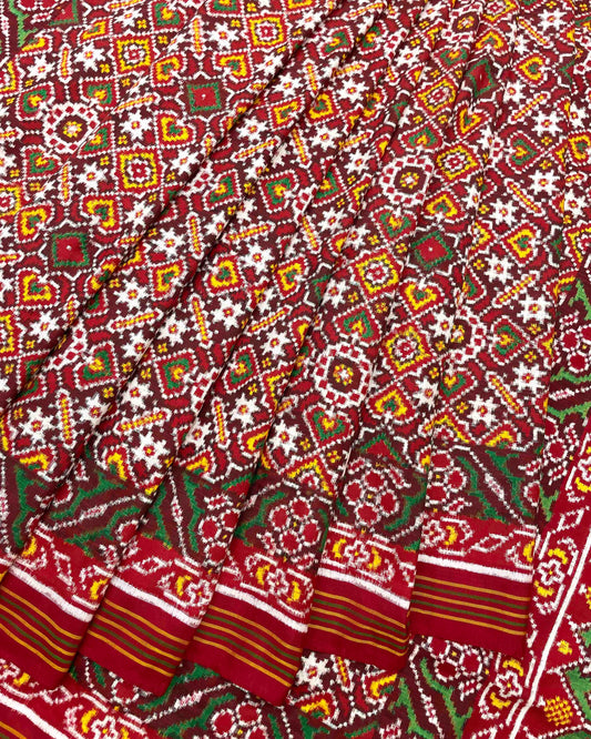 Maroon red manekchowk design double ikat patola saree