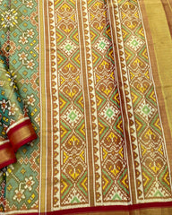 Maroon & Turquoise Navratan Tissue Patola Saree