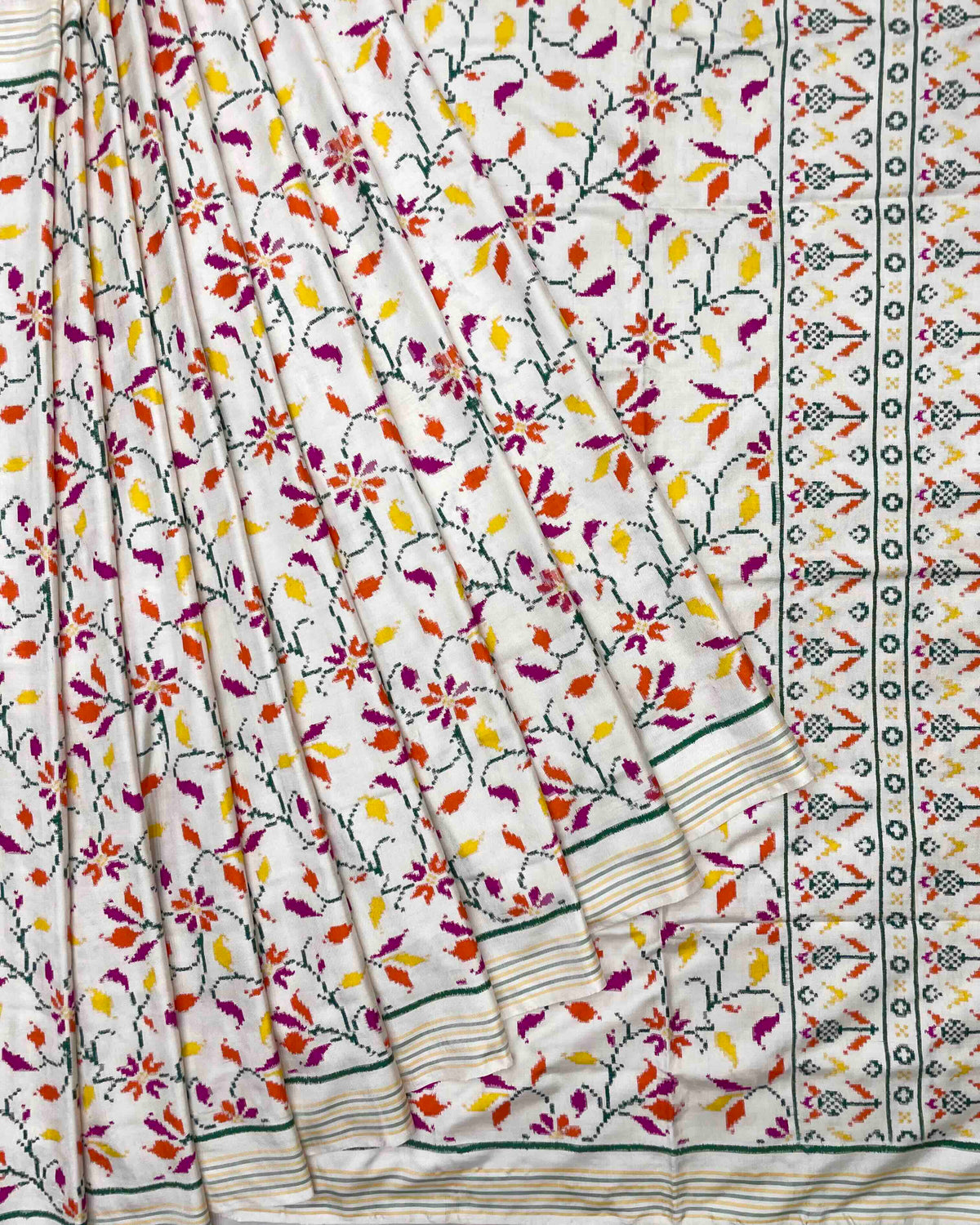 Off White Fancy Leaves Double Ikat Patola Saree