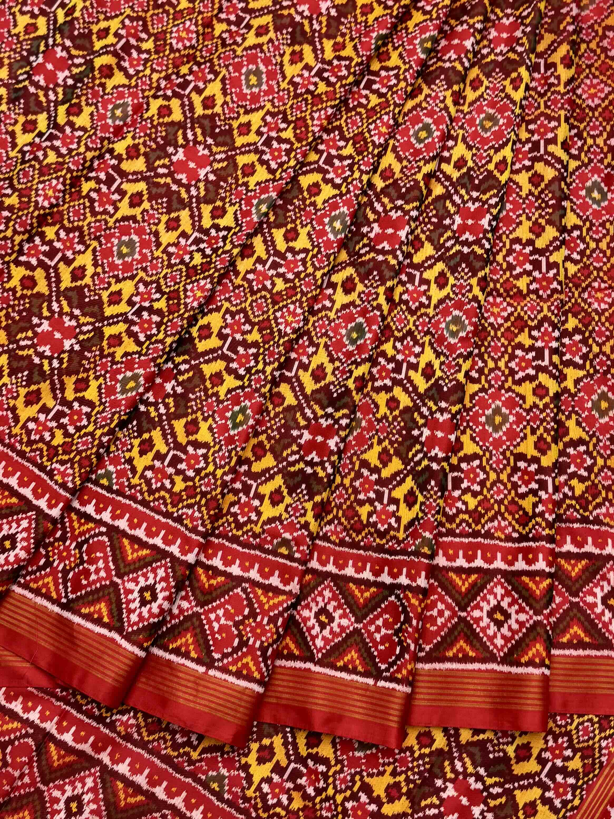 Red & musterd navratan Patola Saree