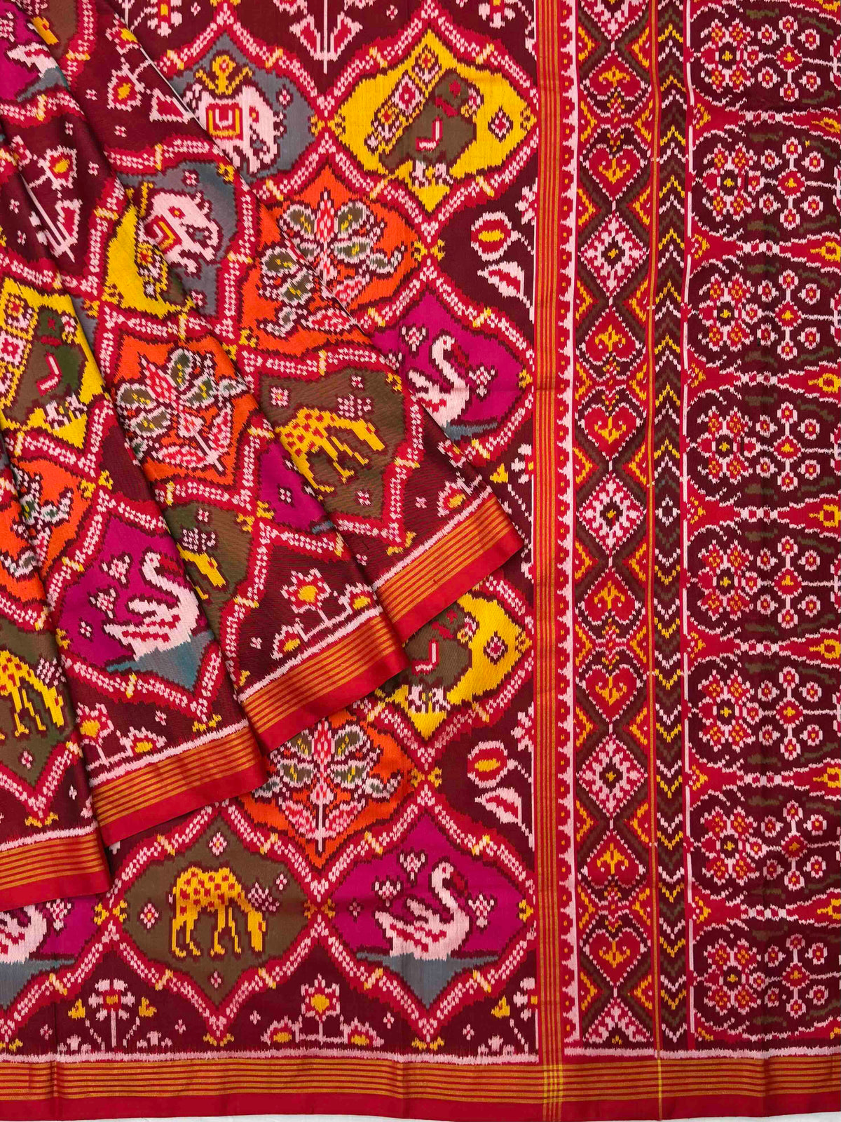 Multi figure single ikat Patan Patola