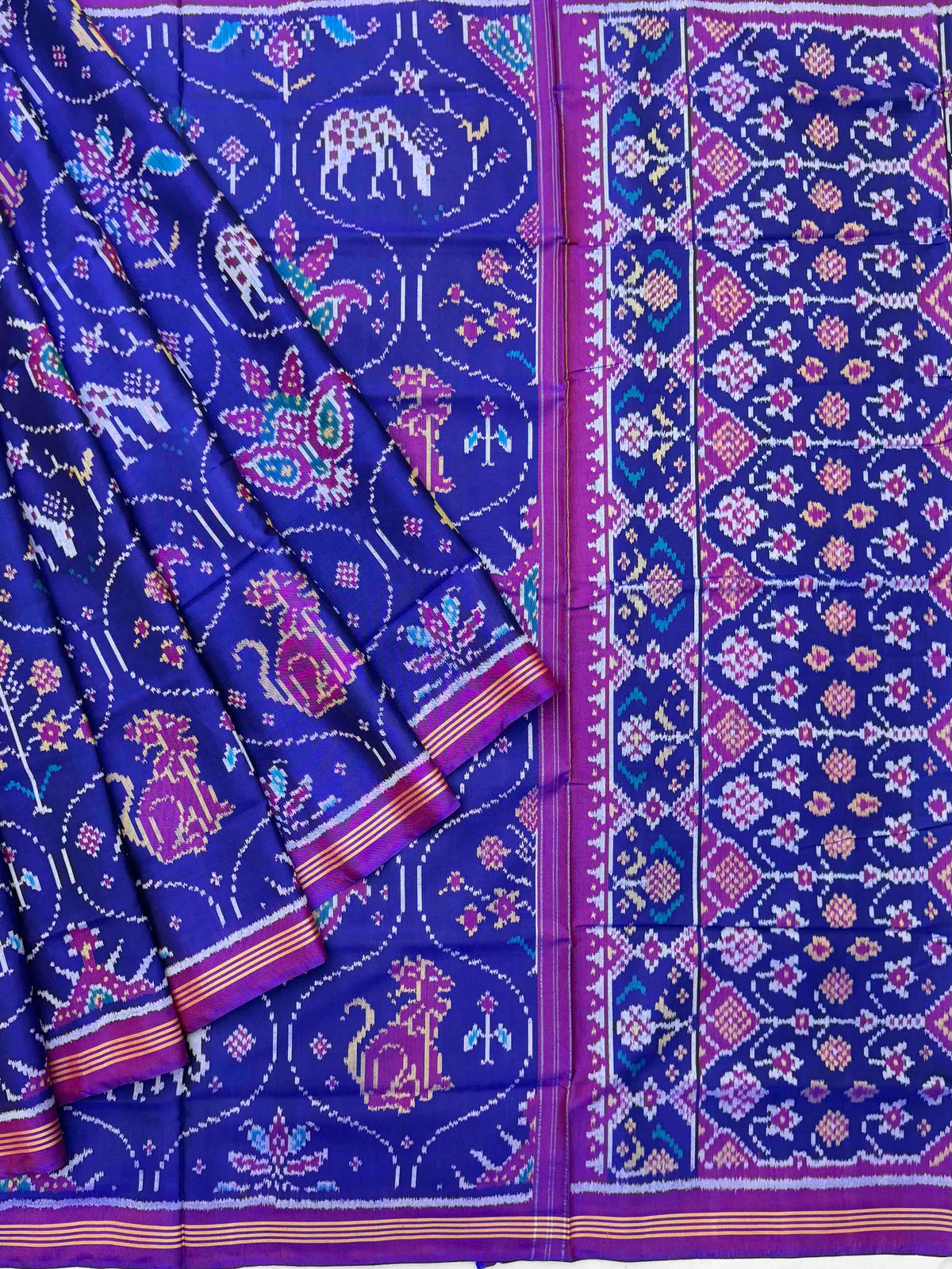 Royal Blue & magenta multi figure Patola saree