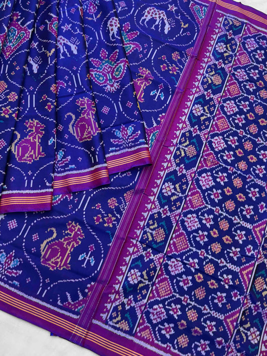 Royal Blue & magenta multi figure Patola saree