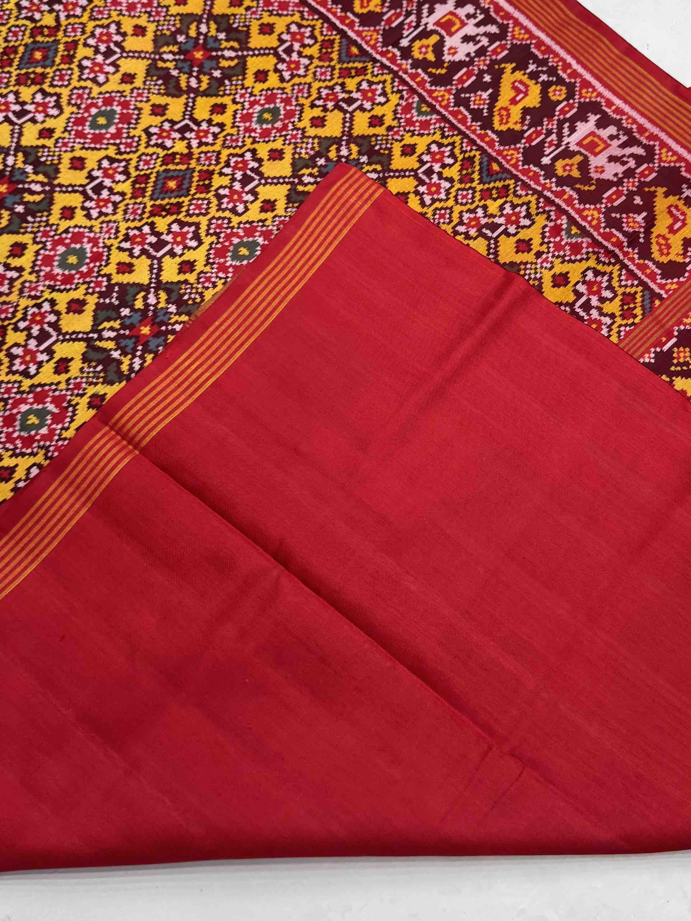 Navratan narikunj border pallu Patola Saree