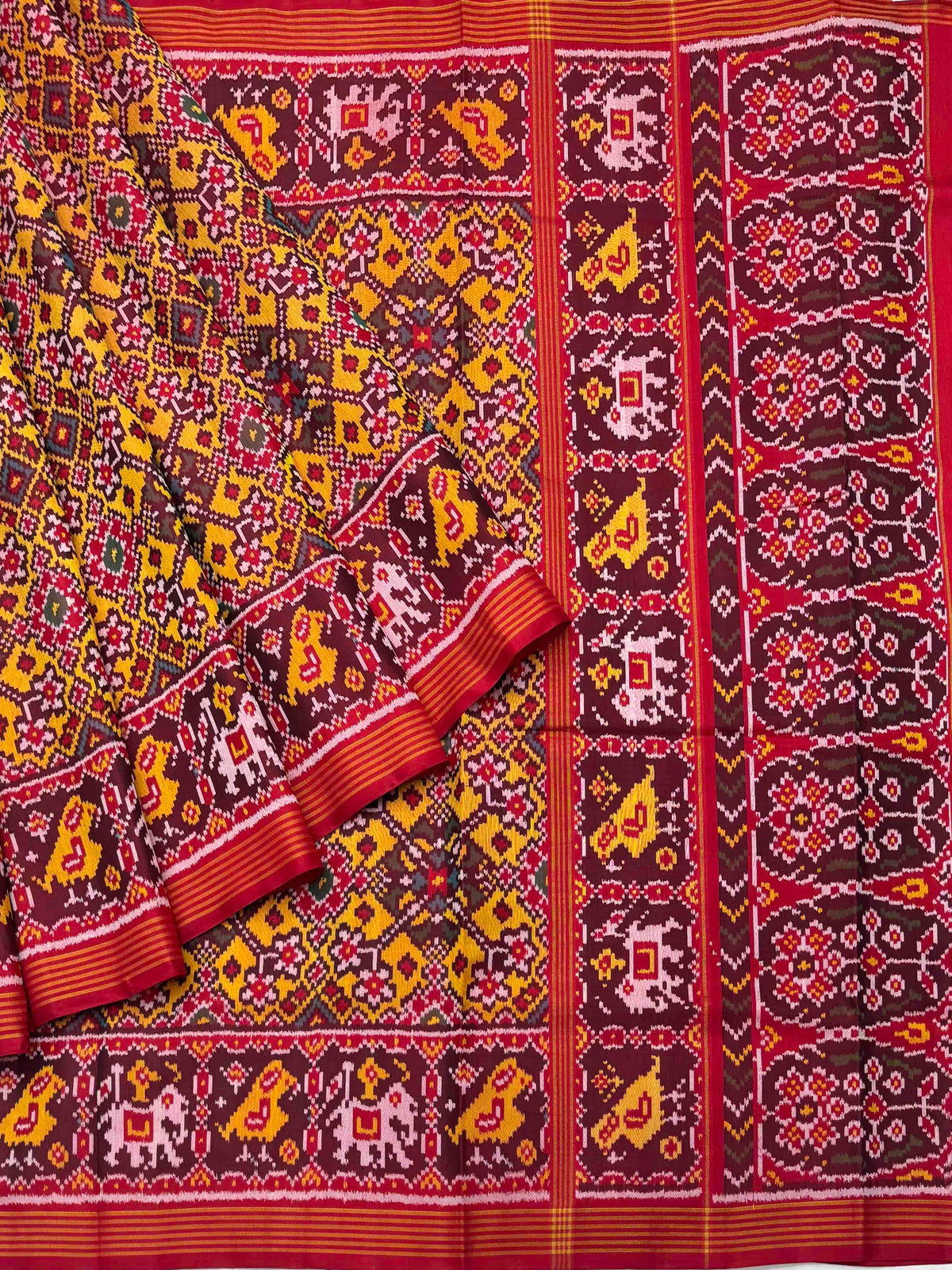 Navratan narikunj border pallu Patola Saree