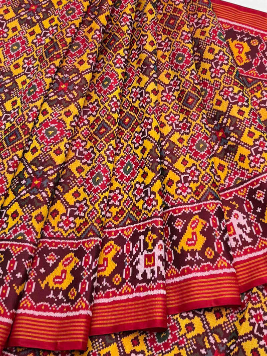 Navratan narikunj border pallu Patola Saree