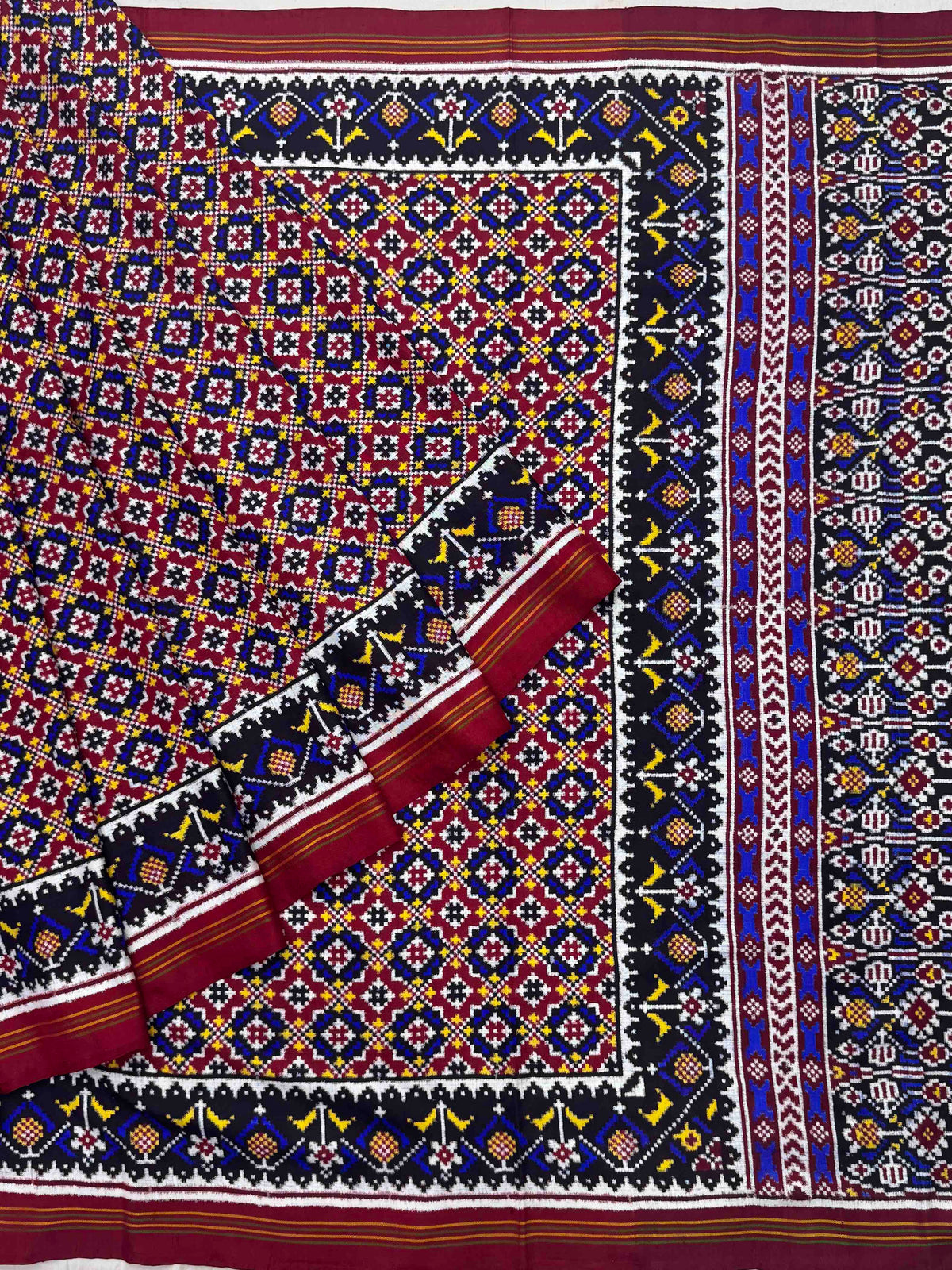 Maroon Buttonful design Patan Patola