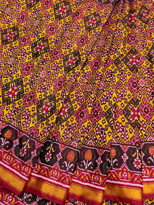 Maroon mustered navratan patola saree