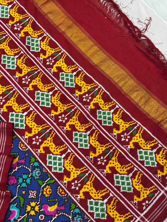 Red & Blue deer border pallu with blue patan patola