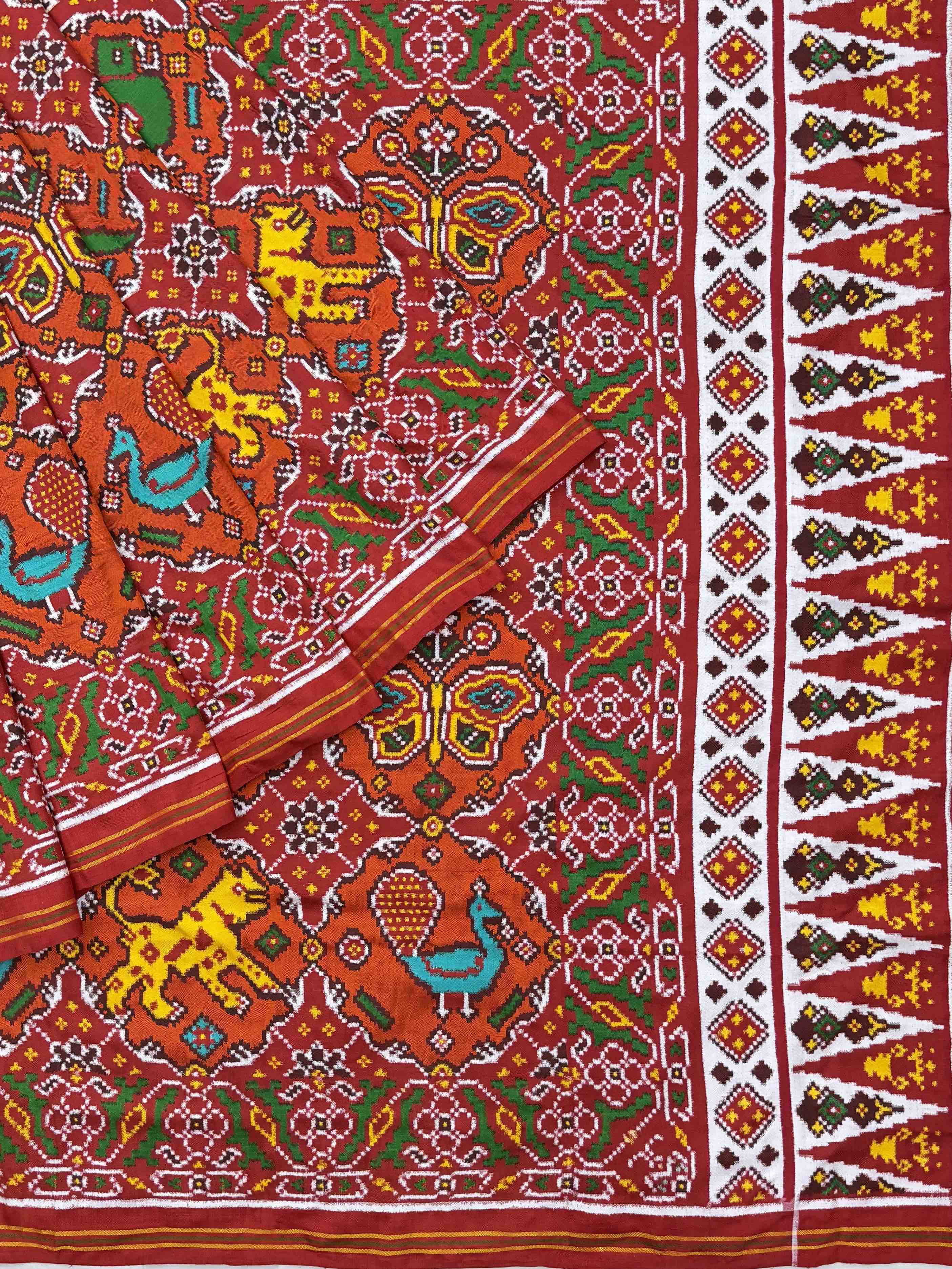 Red and orange big figures in circle Patan Patola Saree