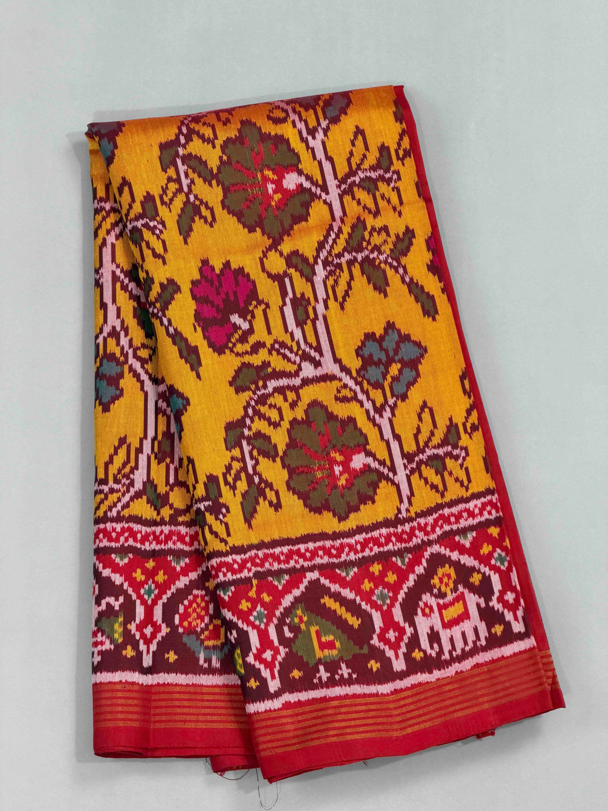 Maroon & musterd creeper design ikat Patola