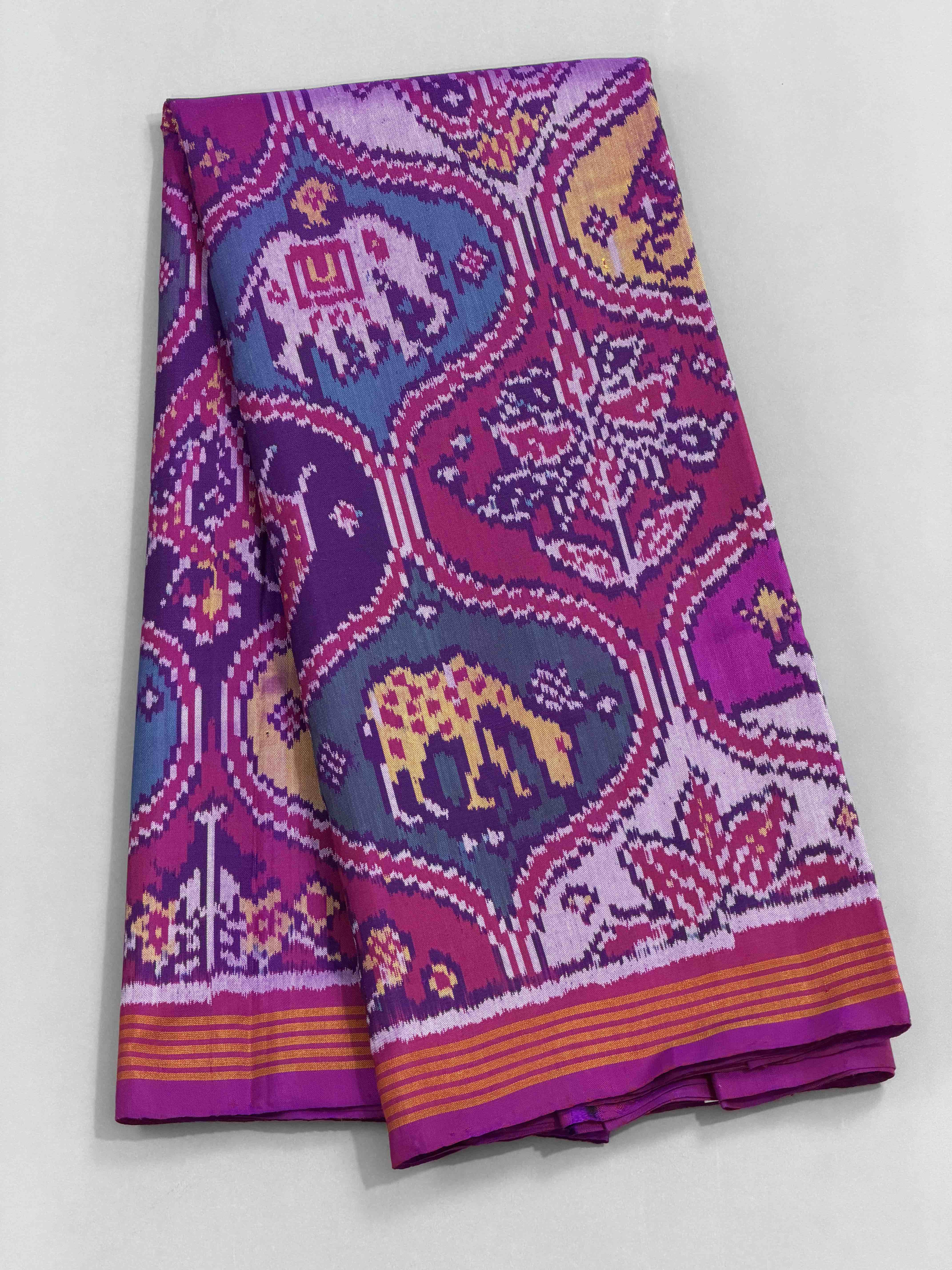 Magenta with multiple figures Patola Saree