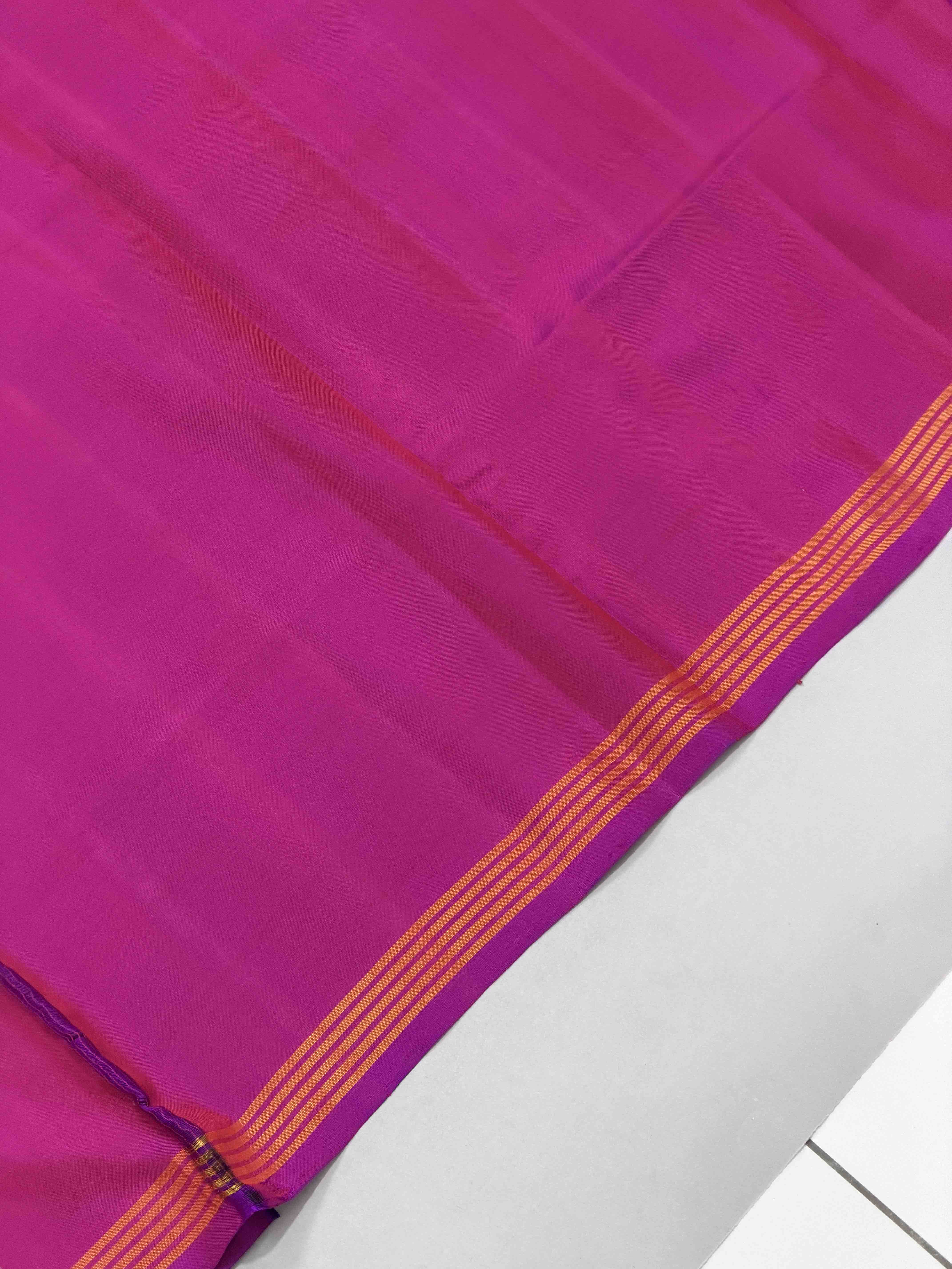 Magenta with multiple figures Patola Saree