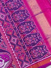 Magenta with multiple figures Patola Saree