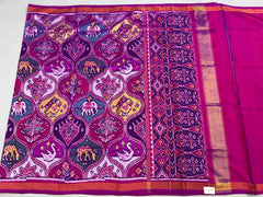 Magenta with multiple figures Patola Saree