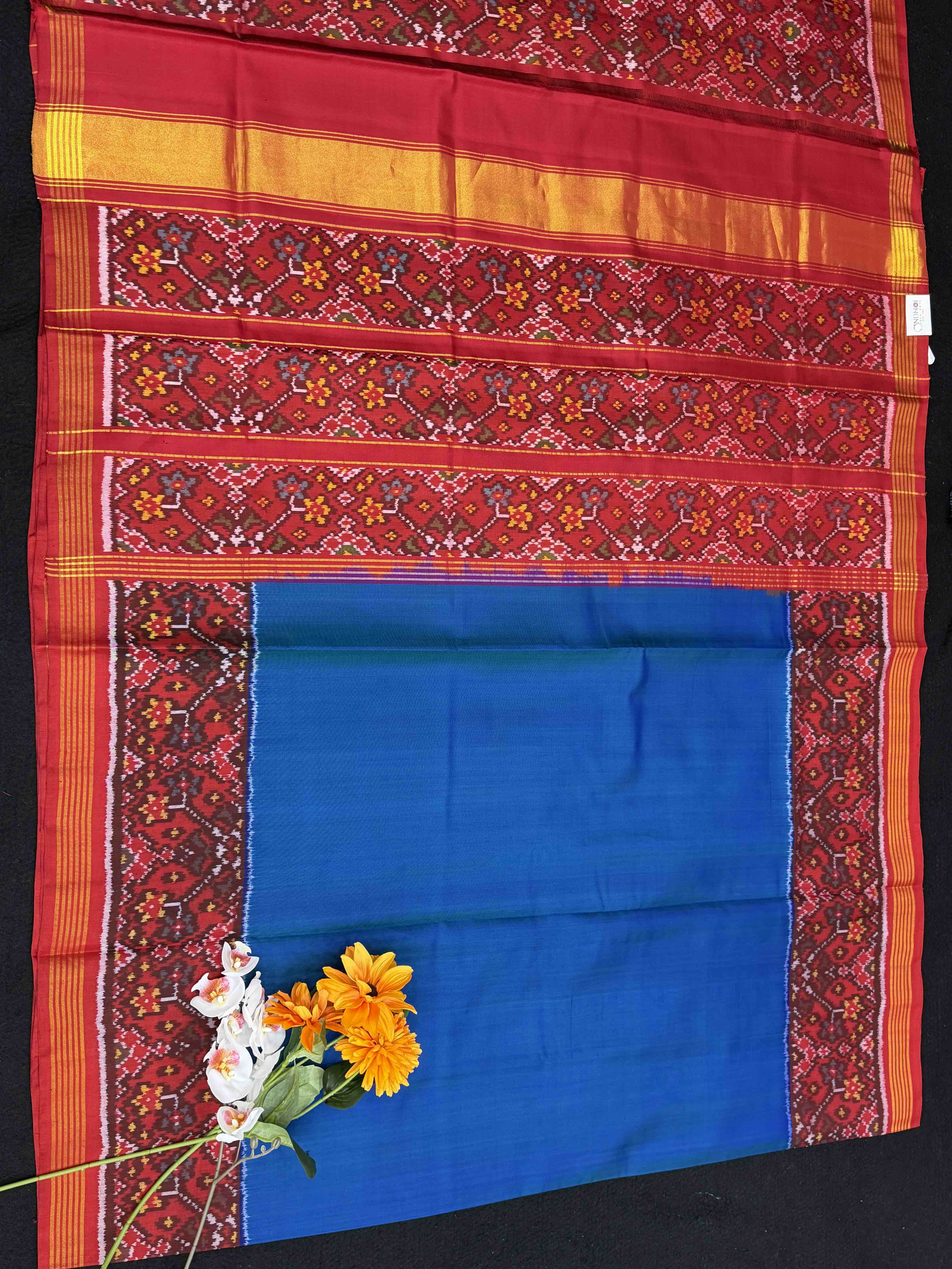 Red navratan pallu peacock blue plain body
