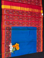 Red navratan pallu peacock blue plain body