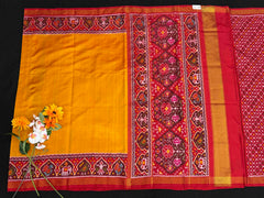Red & Musterd plain Gala border patola saree