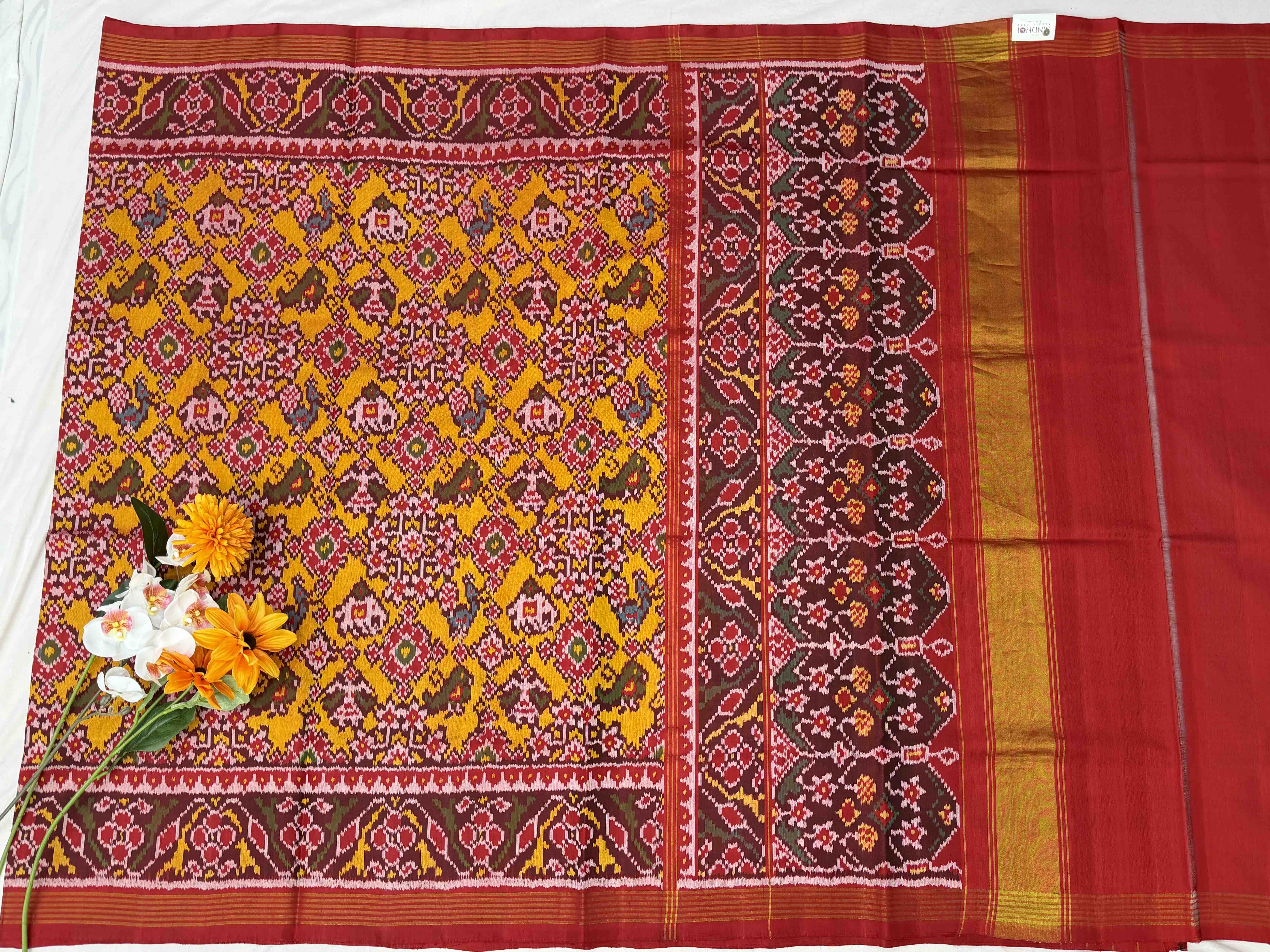 Maroon & Musterd Navaratan Narikunj Patola Sarees