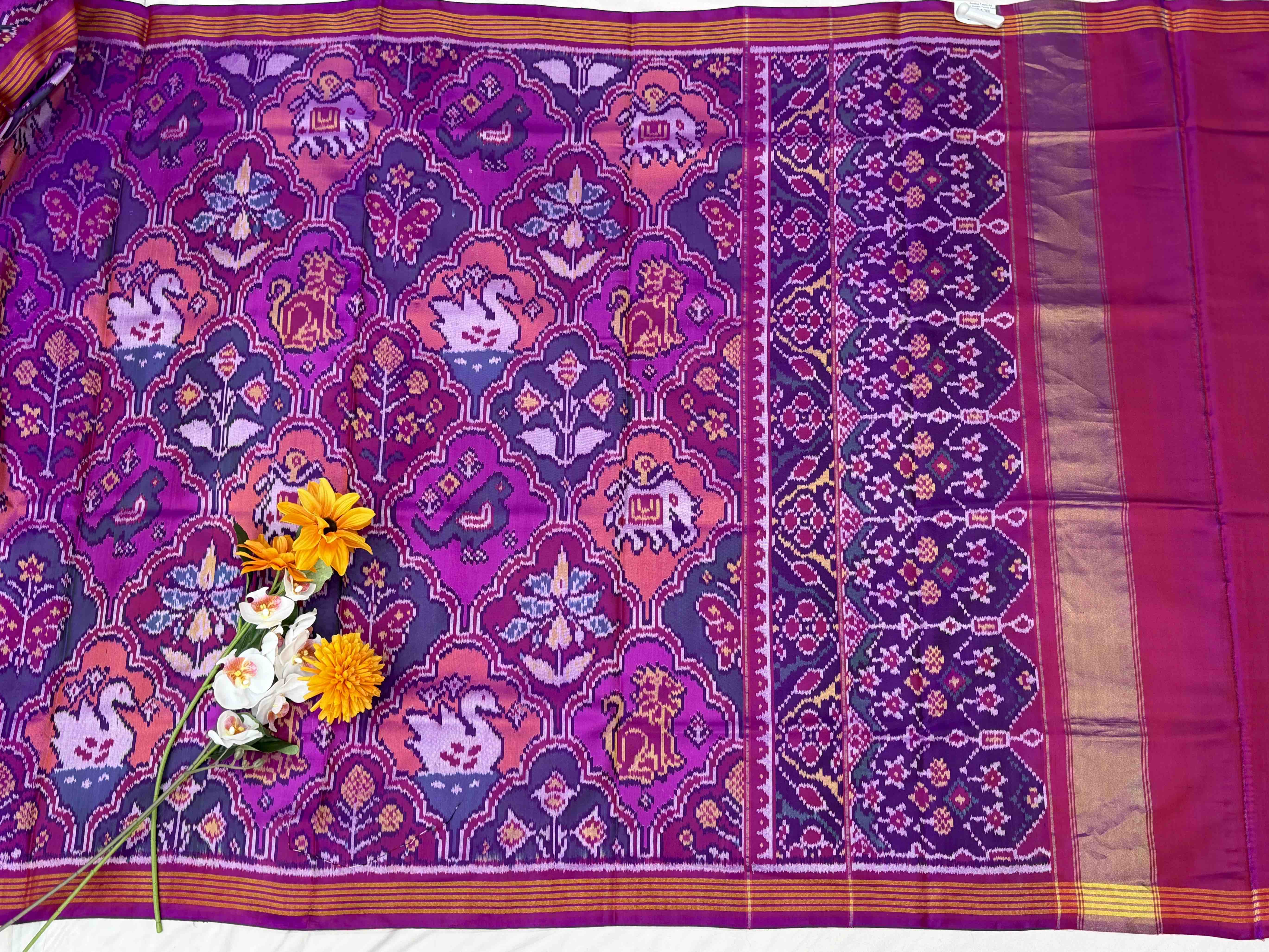 Magenta pink multiple motif figure Patola Saree