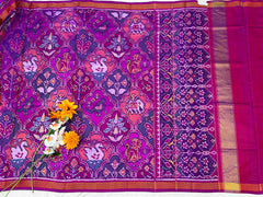 Magenta pink multiple motif figure Patola Saree