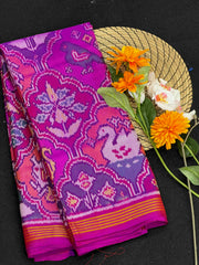 Magenta pink multiple motif figure Patola Saree