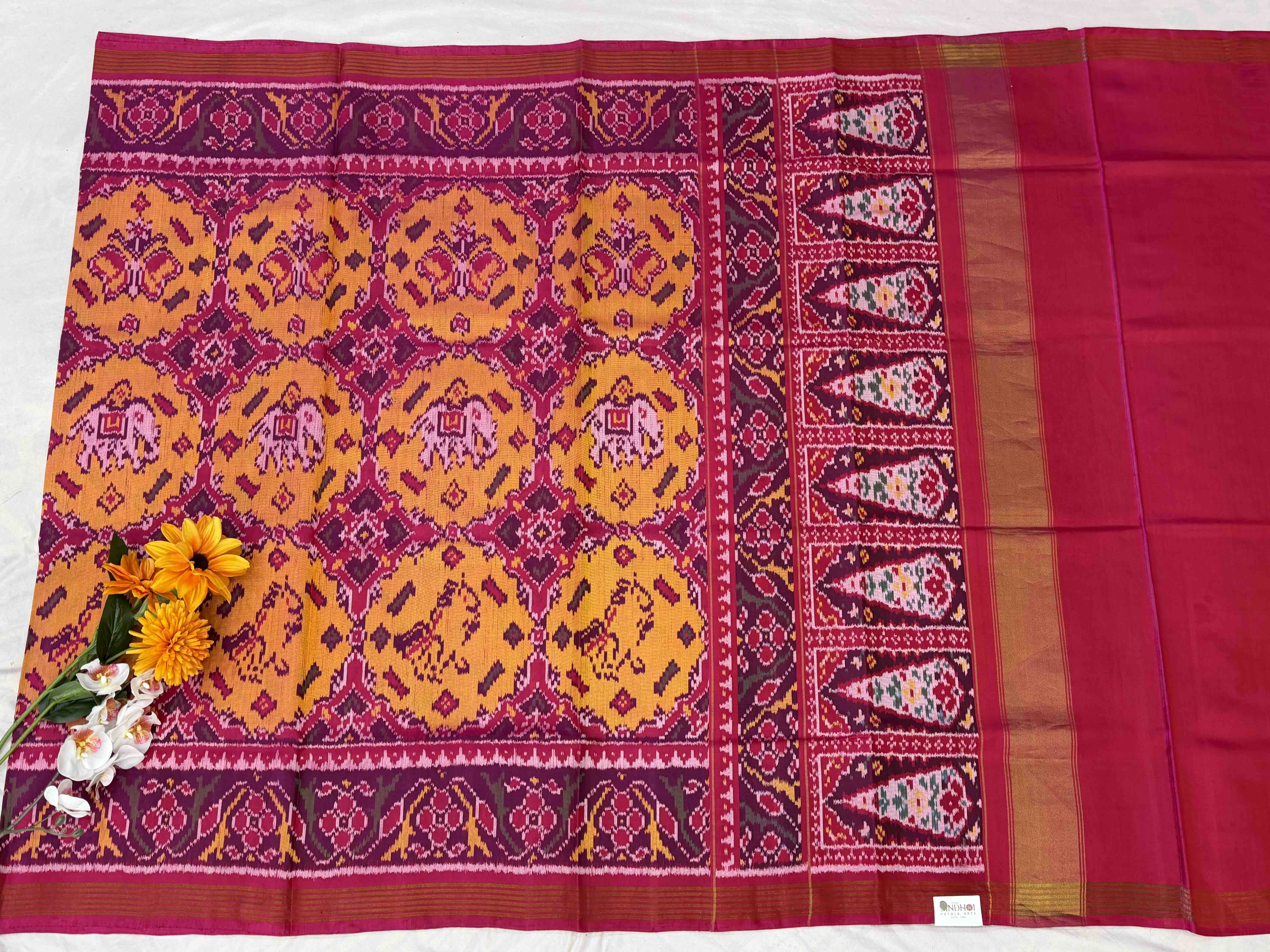 Chhabdi Figure Pink & musterd patola Saree