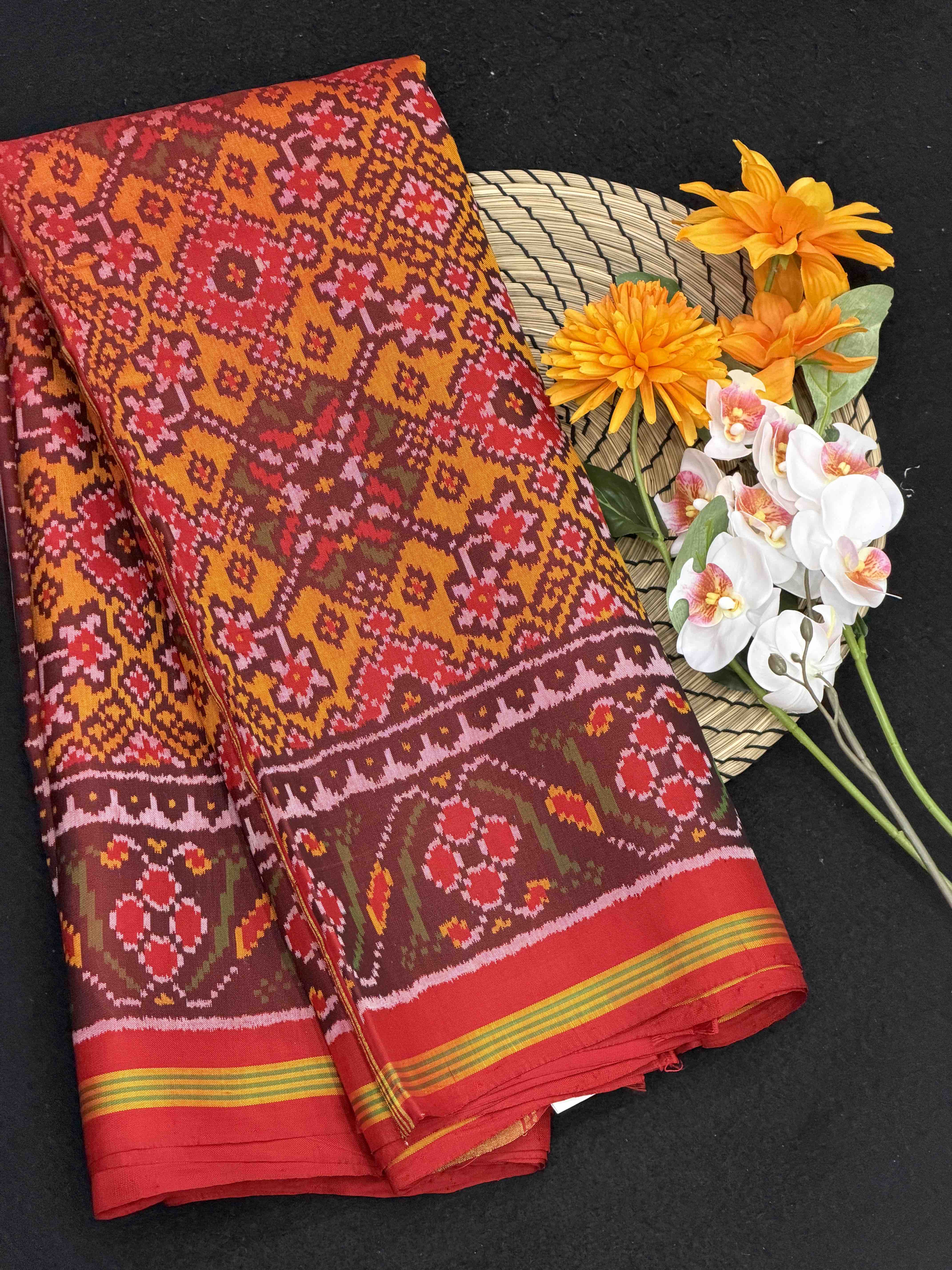 Maroon & musterd Navaratan Patola saree