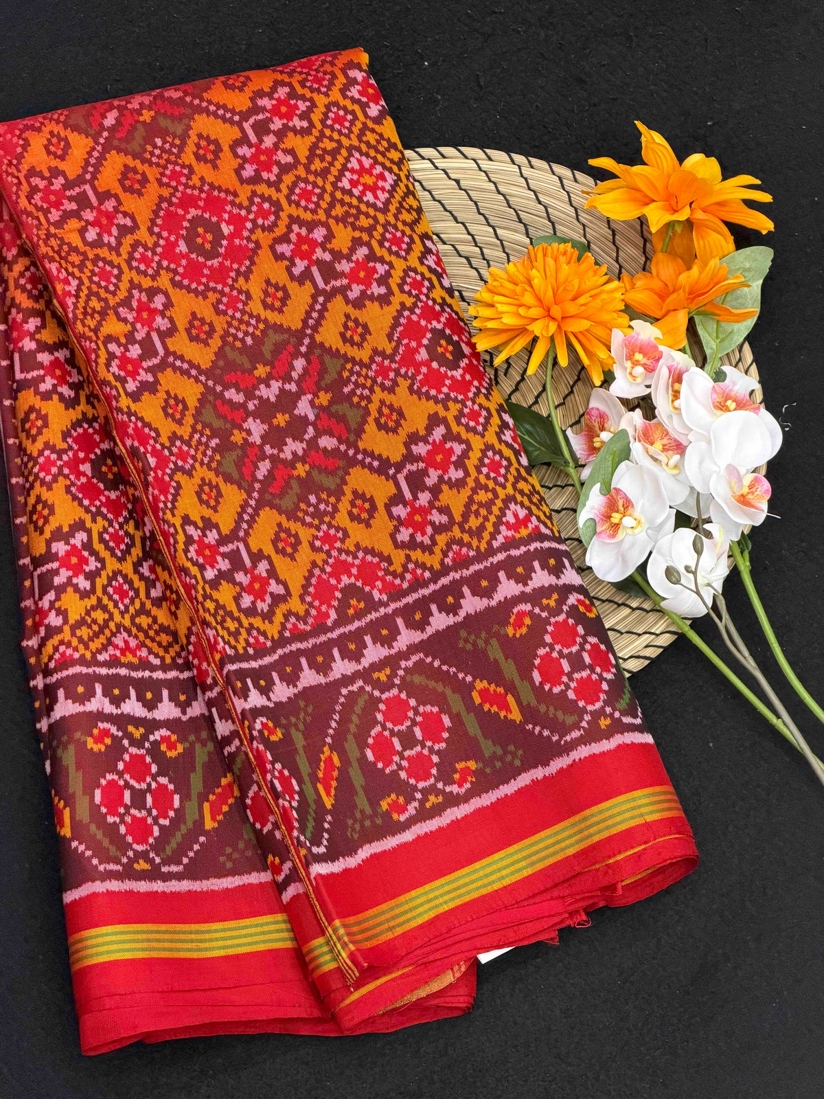 Maroon & musterd Navaratan Patola saree
