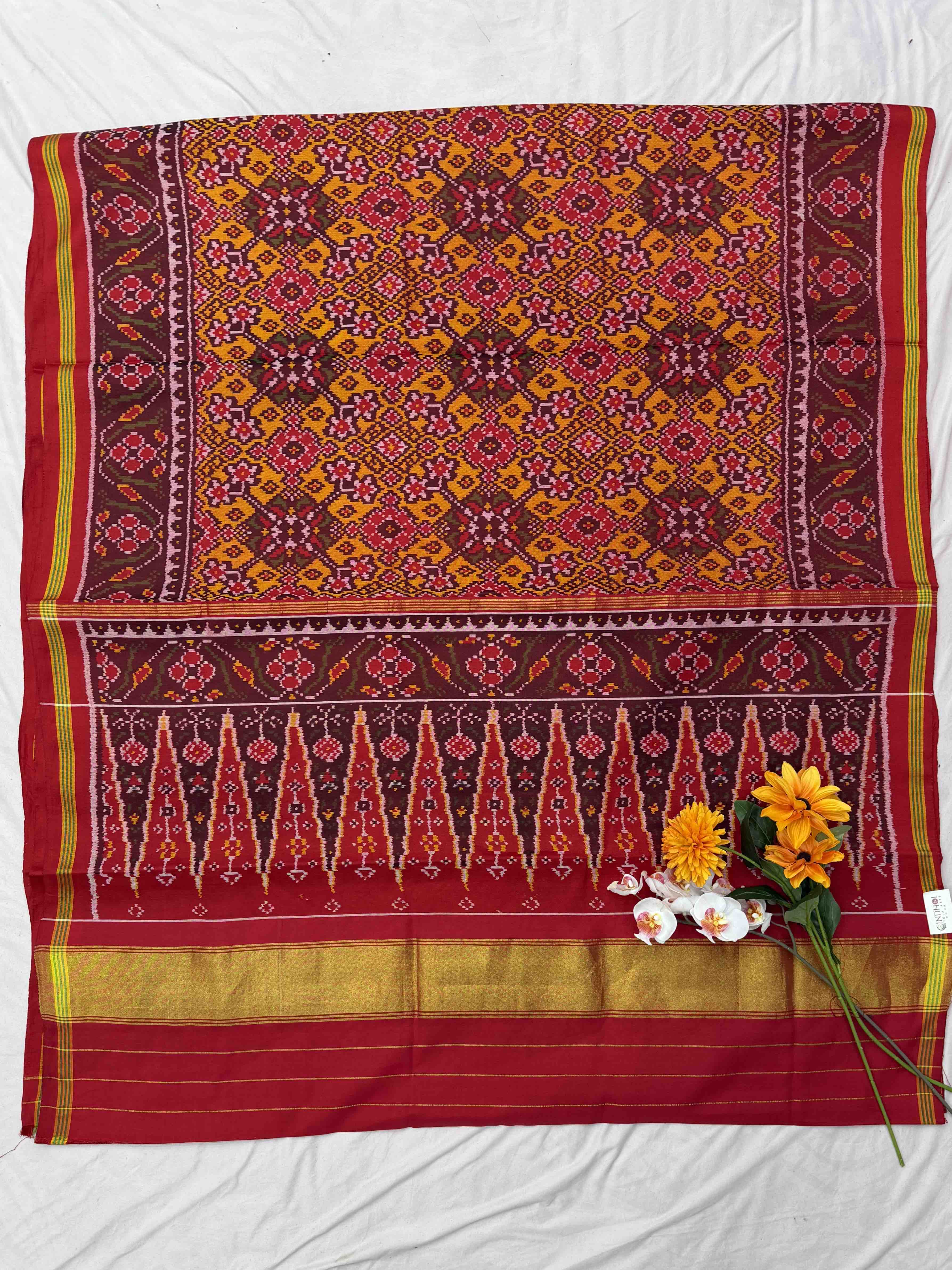 Maroon & musterd Navaratan Patola saree