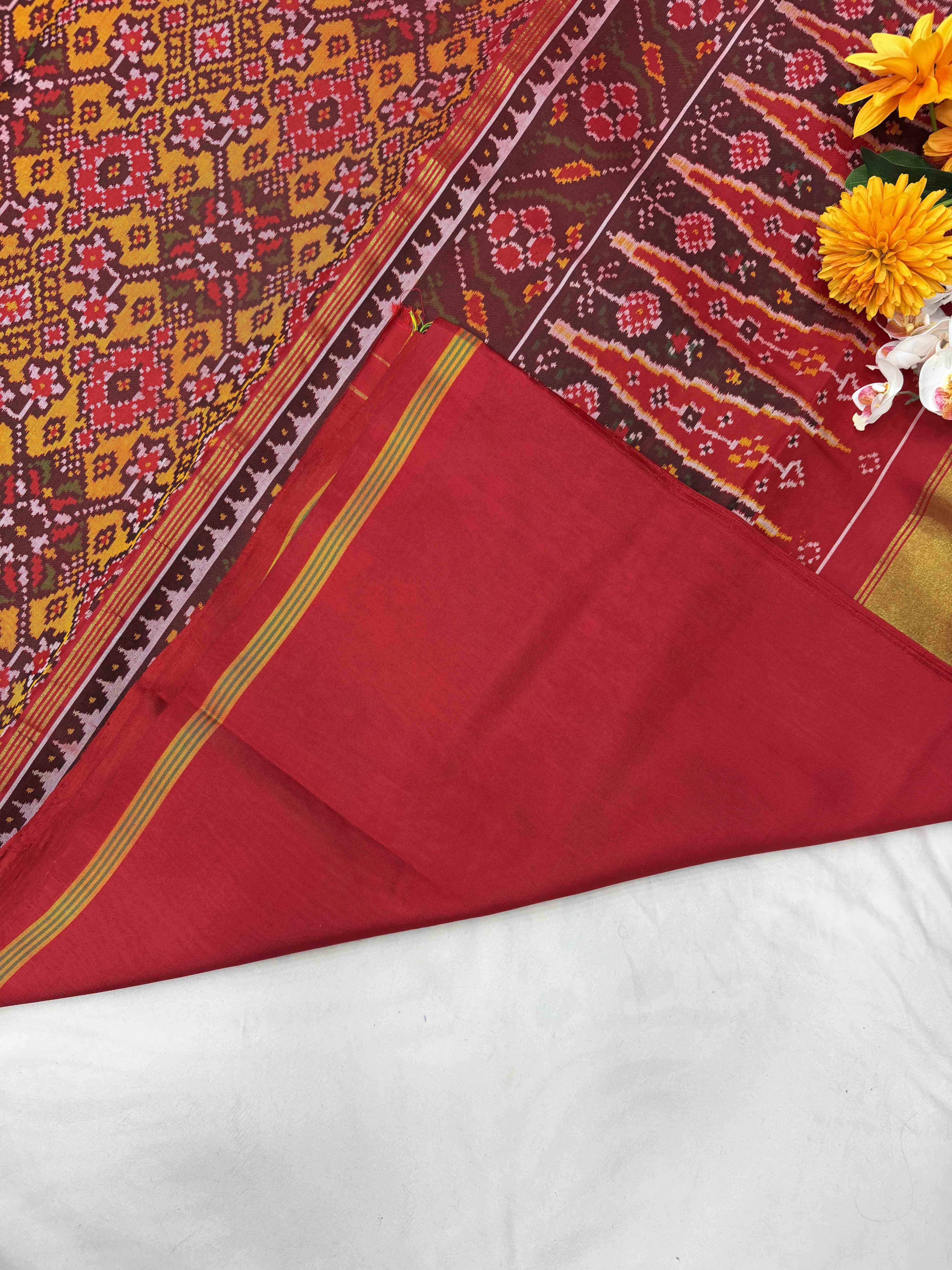 Maroon & musterd Navaratan Patola saree