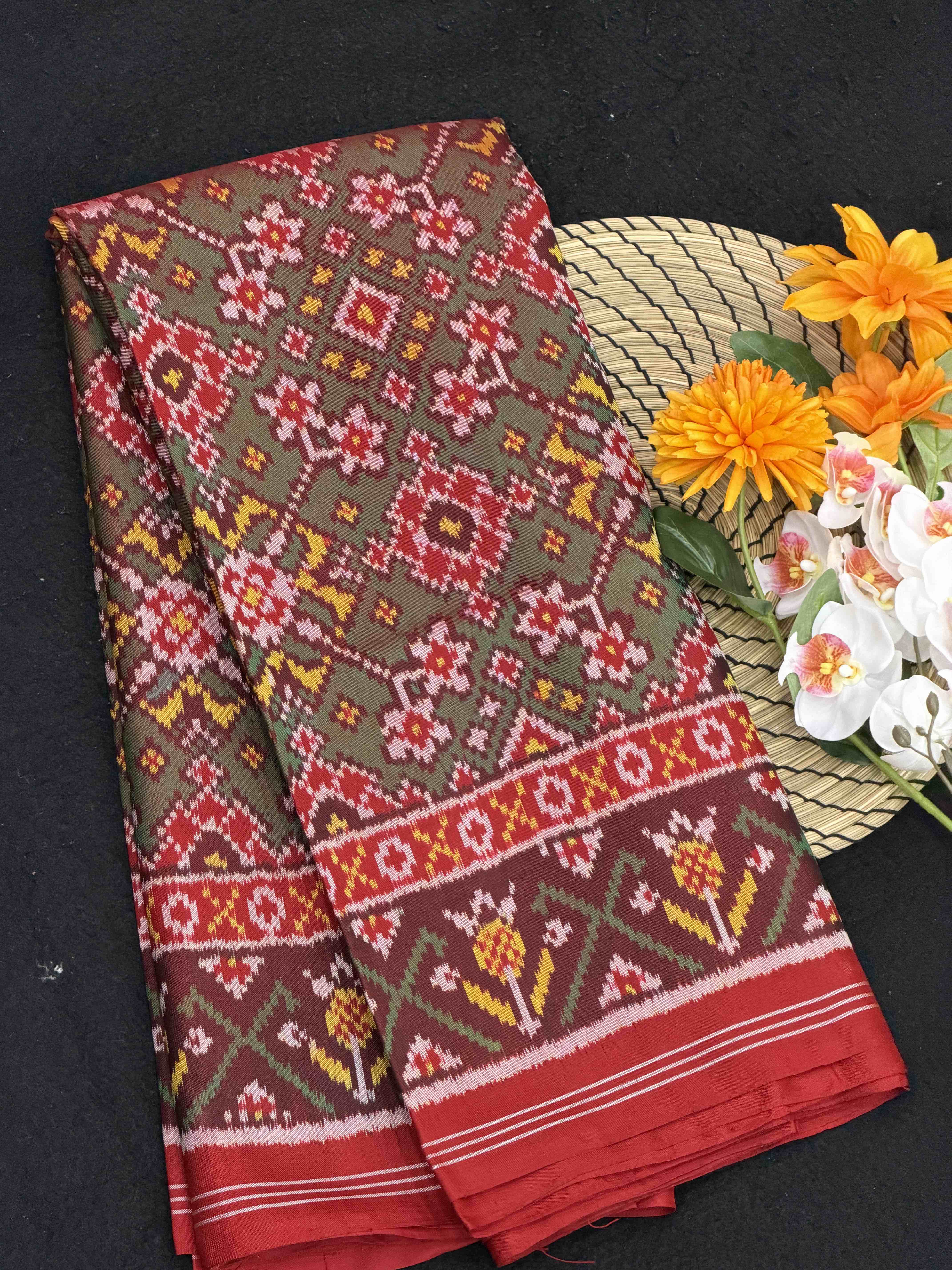 Red & shaded green Navaratan Patola Saree