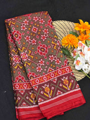 Red & shaded green Navaratan Patola Saree
