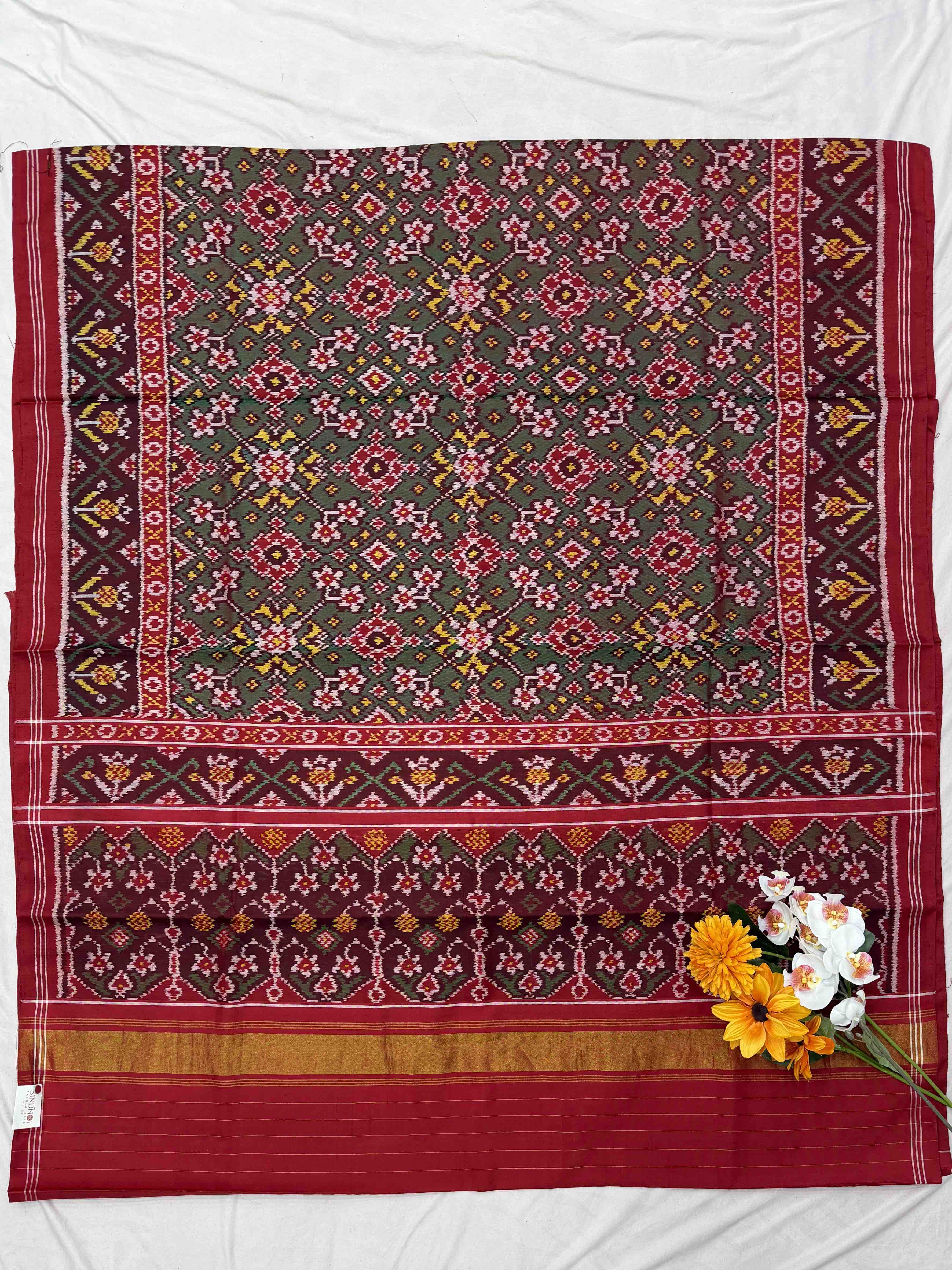 Red & shaded green Navaratan Patola Saree