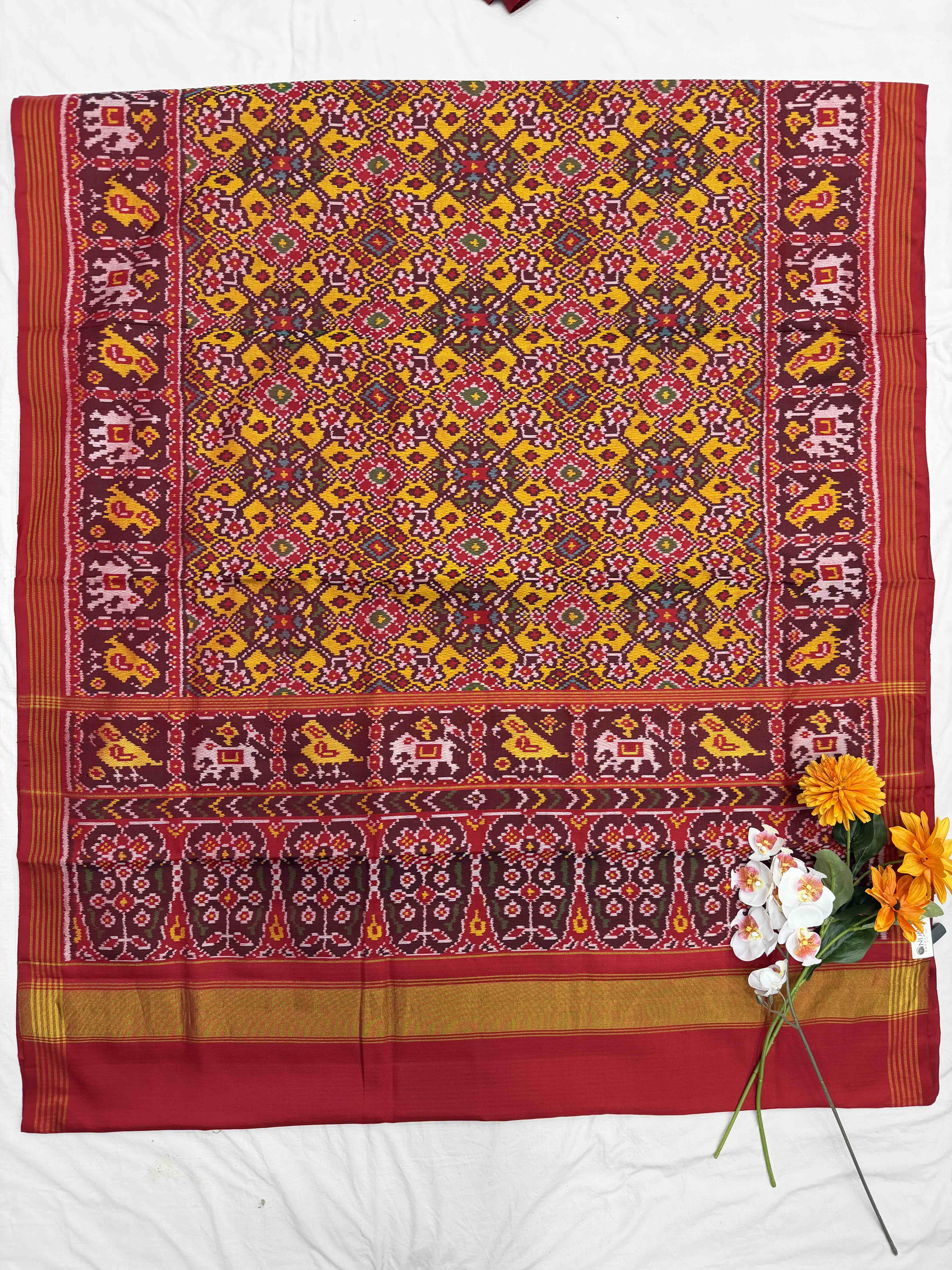 Red narikunj border pallu & musterd navaratn Patola Saree