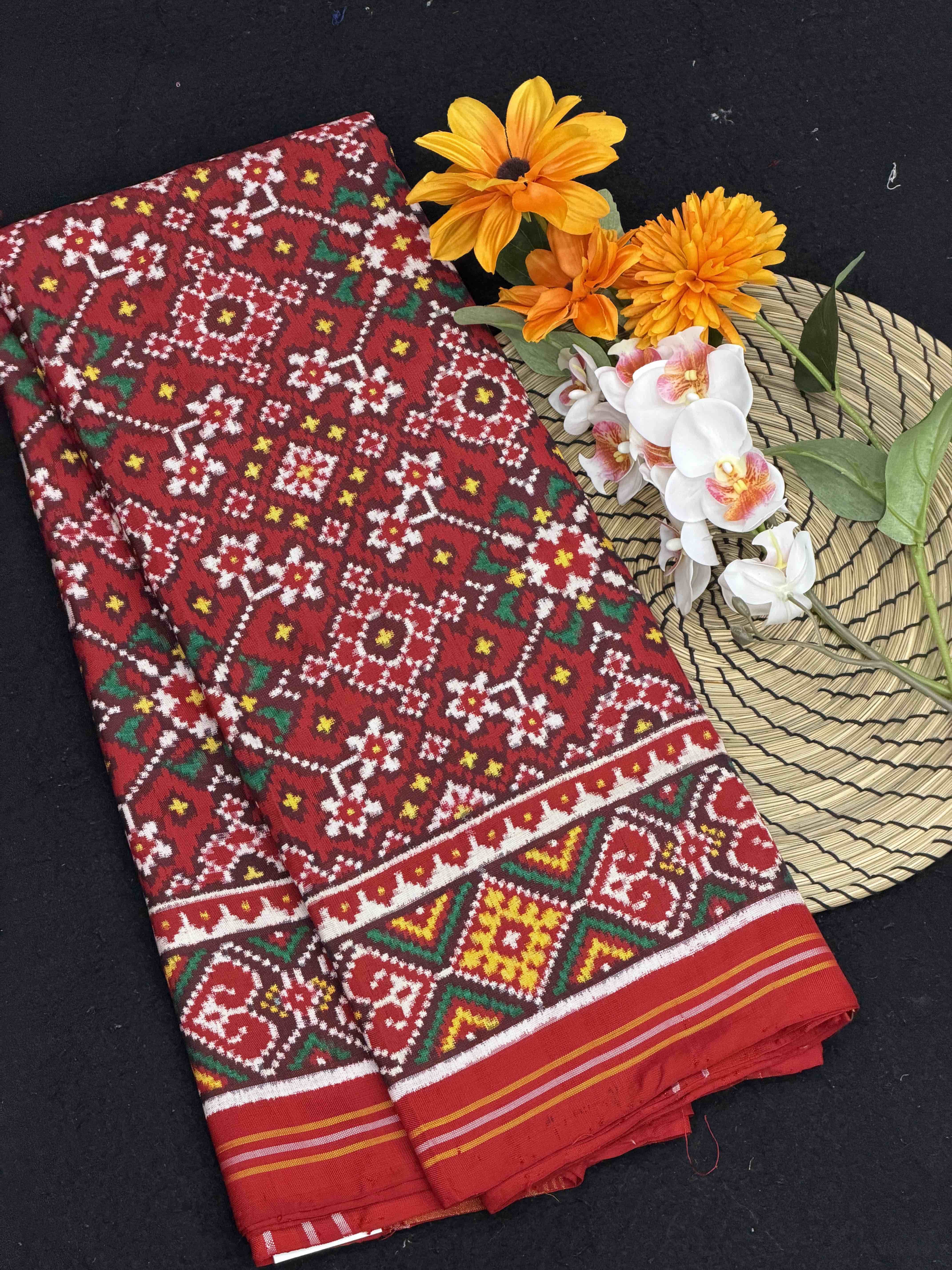 Traditional Maroon navaratan Patola saree