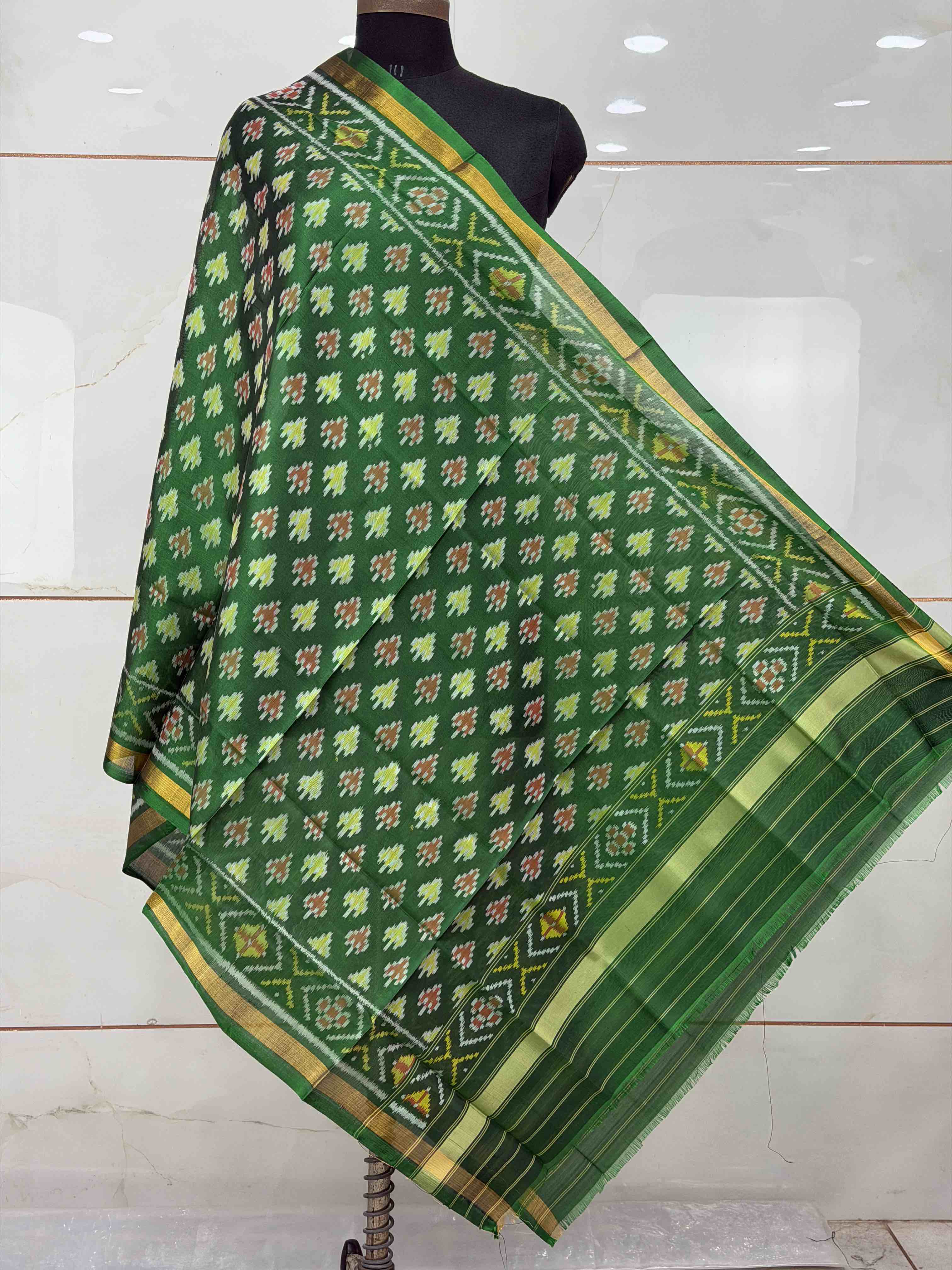 Small dupatta in green shade woven in single ikat