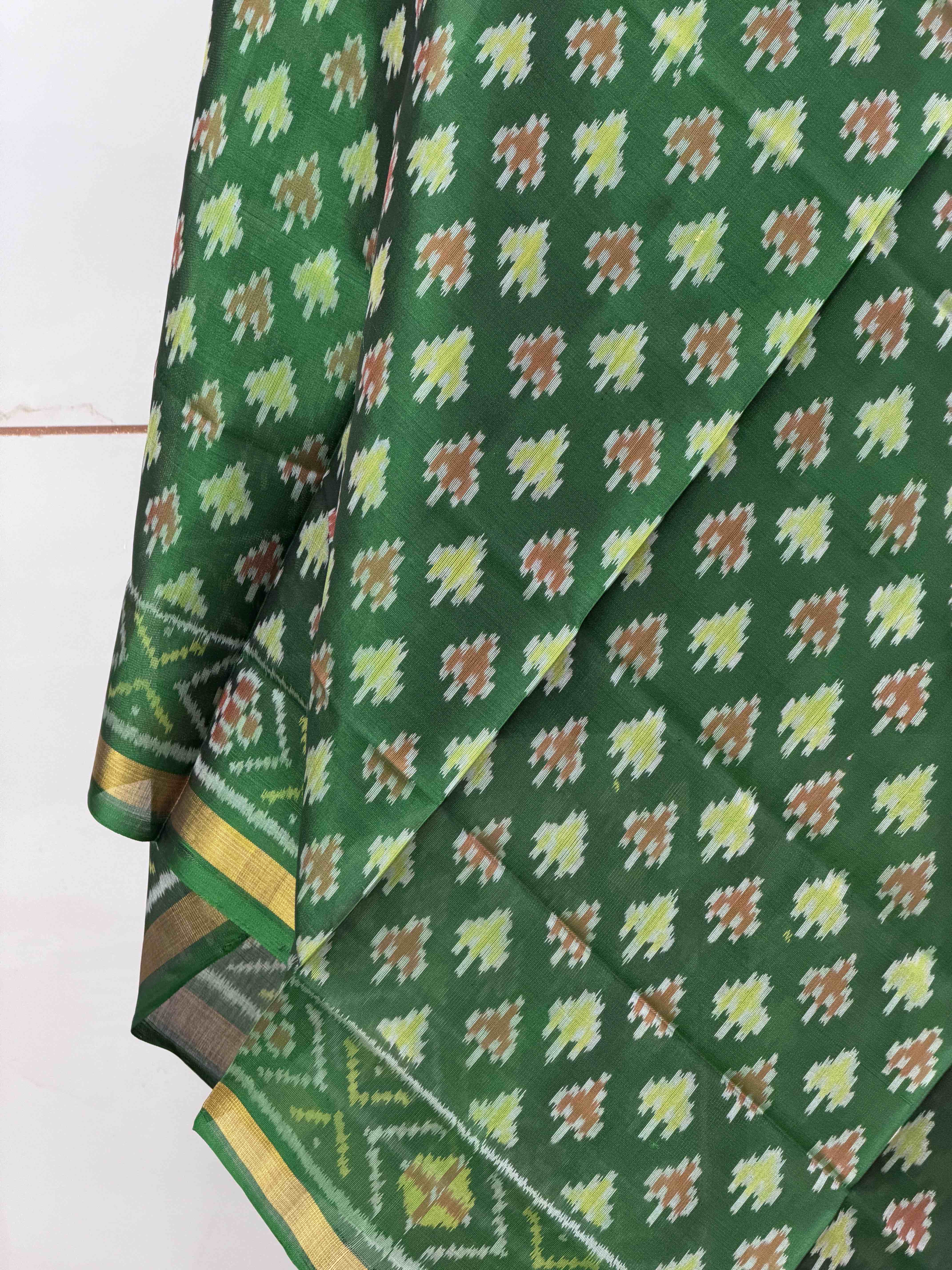 Small dupatta in green shade woven in single ikat