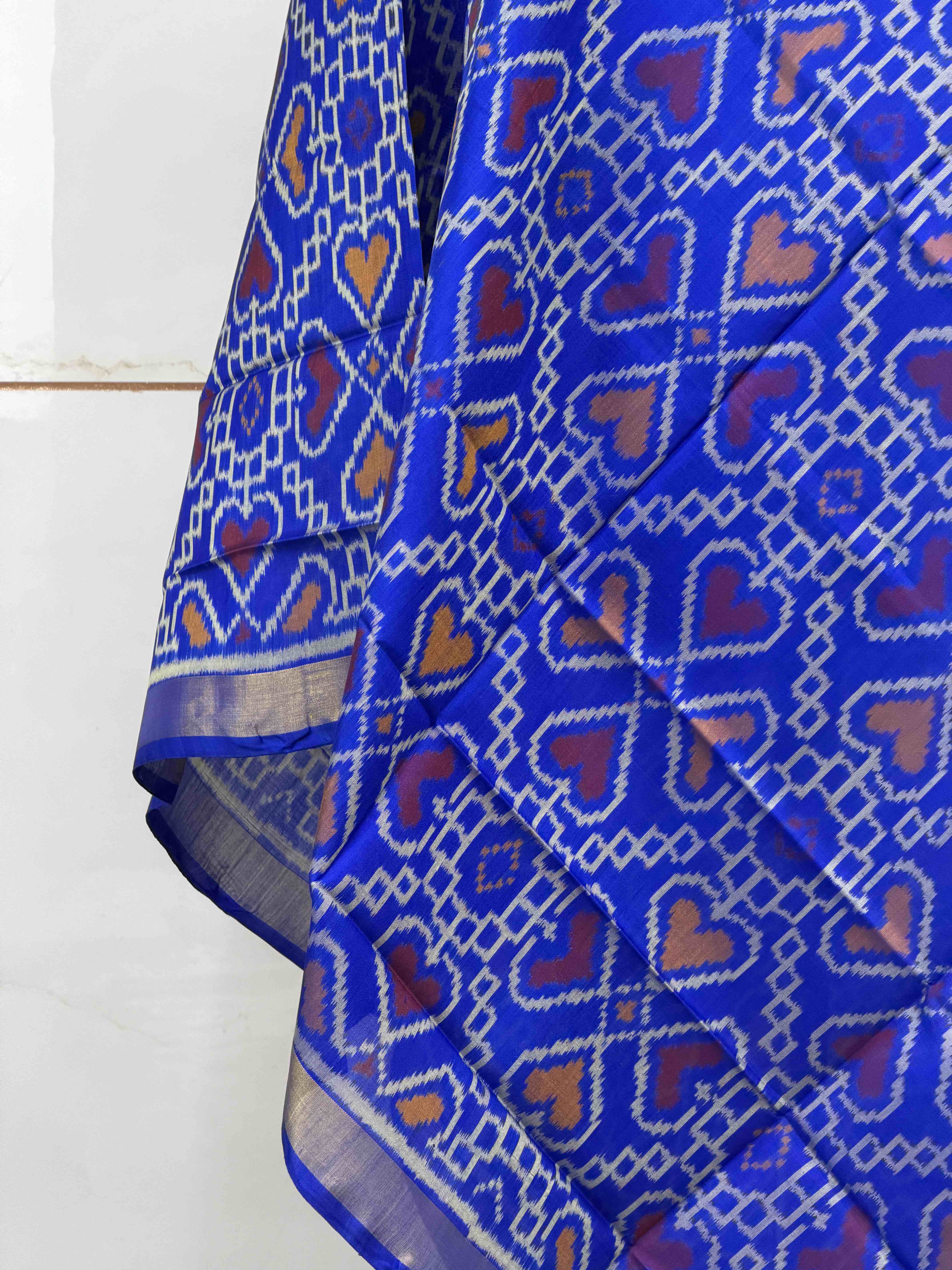 Small dupatta in blue shade in manekchawk pattern woven in single ikat