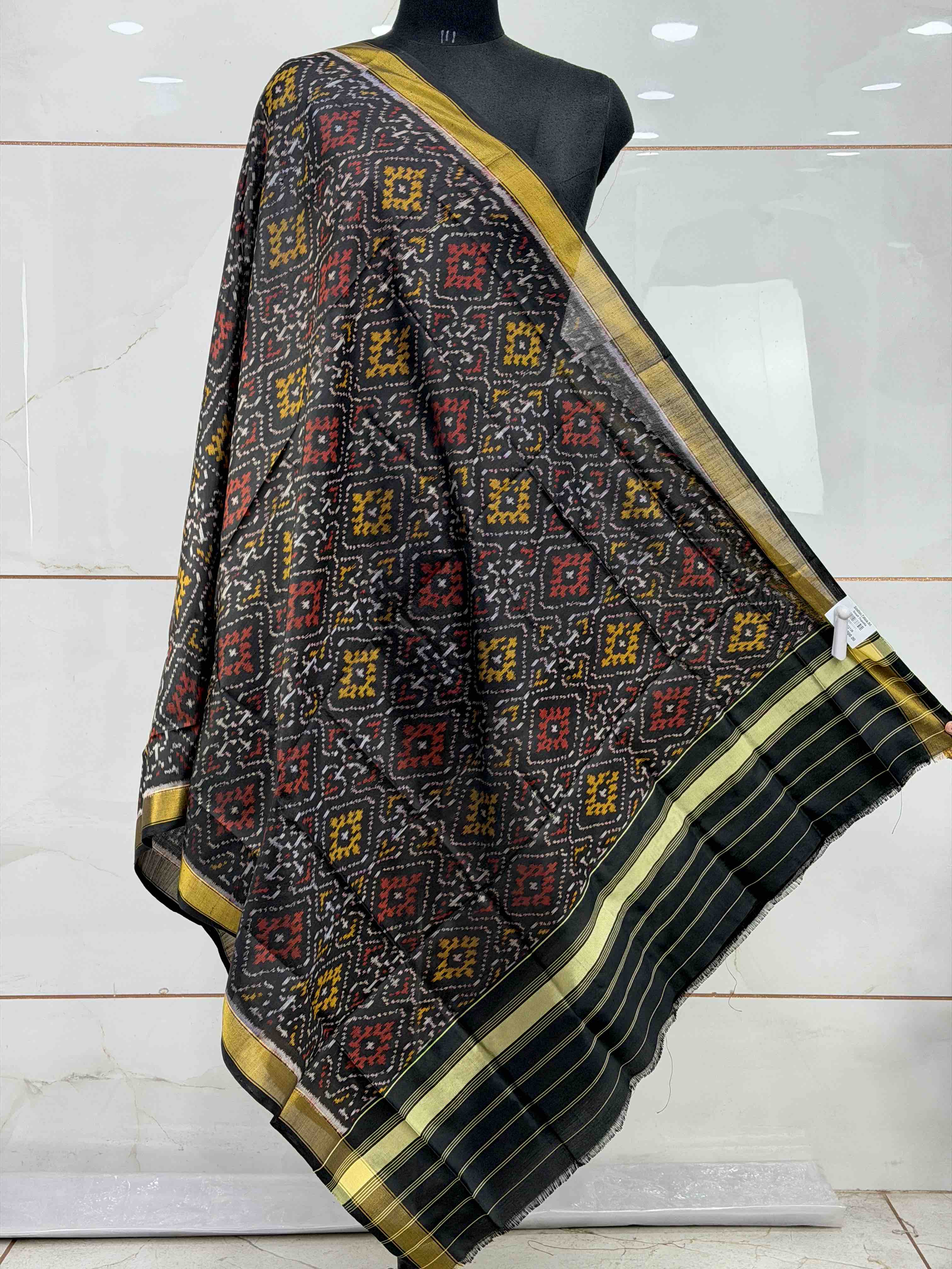 Small dupatta in black panchanda design single ikat