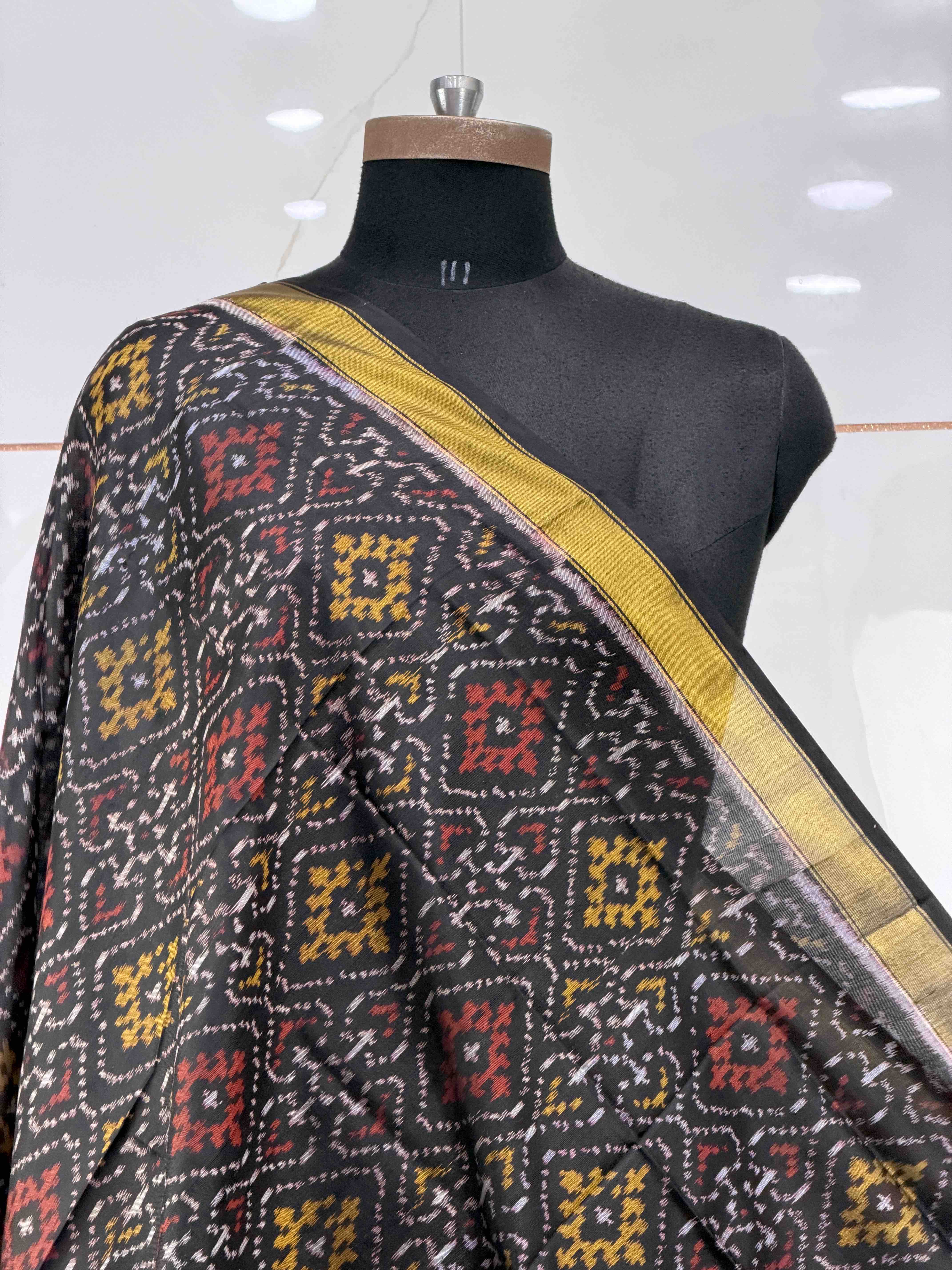 Small dupatta in black panchanda design single ikat