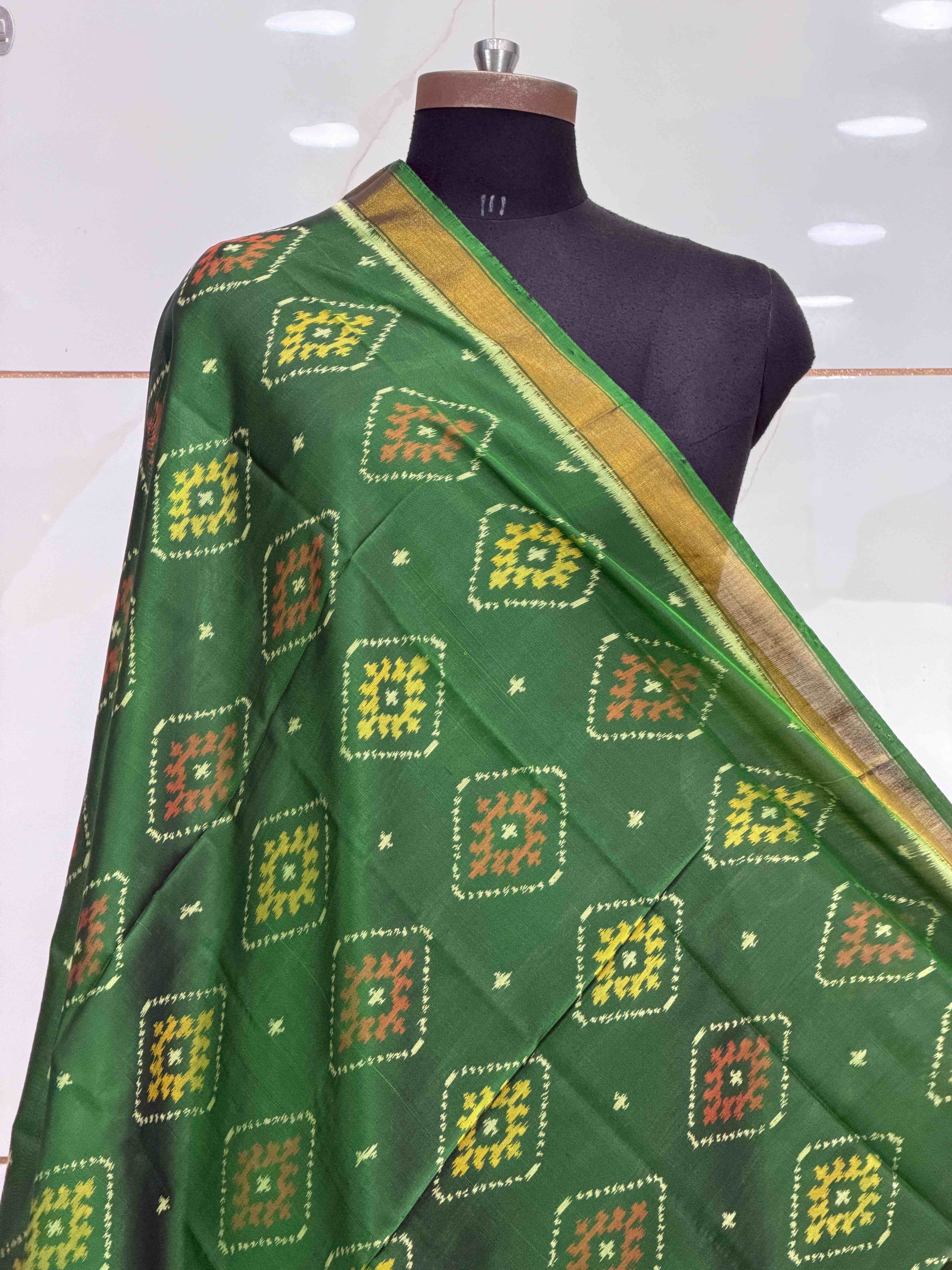 Small dupatta in Green shade panchanda design woven in single ikat